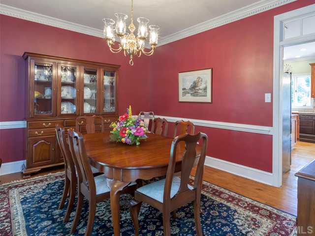 1917 Prescott Place Raleigh, NC 27615 - Photo 12 of 25 This is a view of the dining room as it leads to the kitchen.