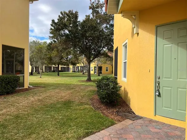 a view of a trees in front of a building