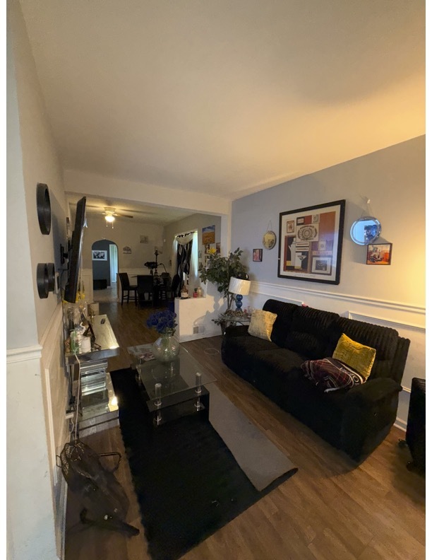 7916 South Normal Avenue Chicago, IL 60620 - Photo 2 of 6 a living room with furniture