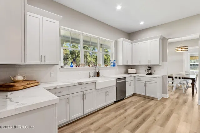 a work room with furniture and a window