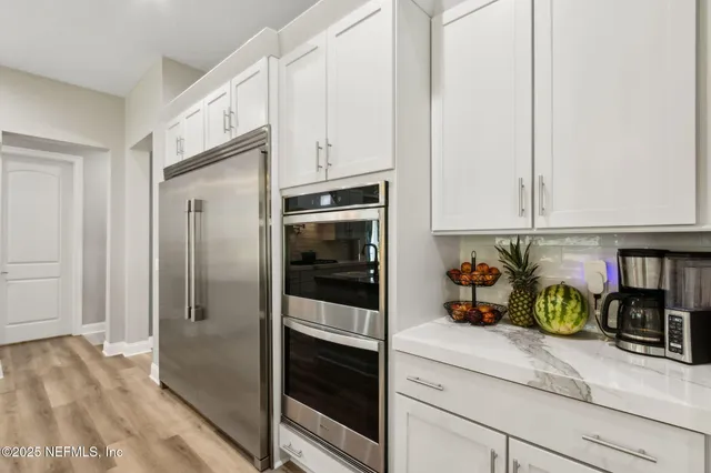 a workspace with furniture and a window