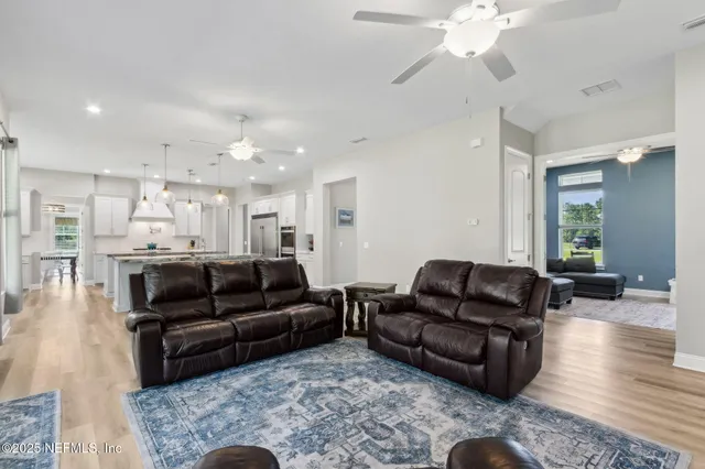 a en suite bathroom with a sink and a mirror