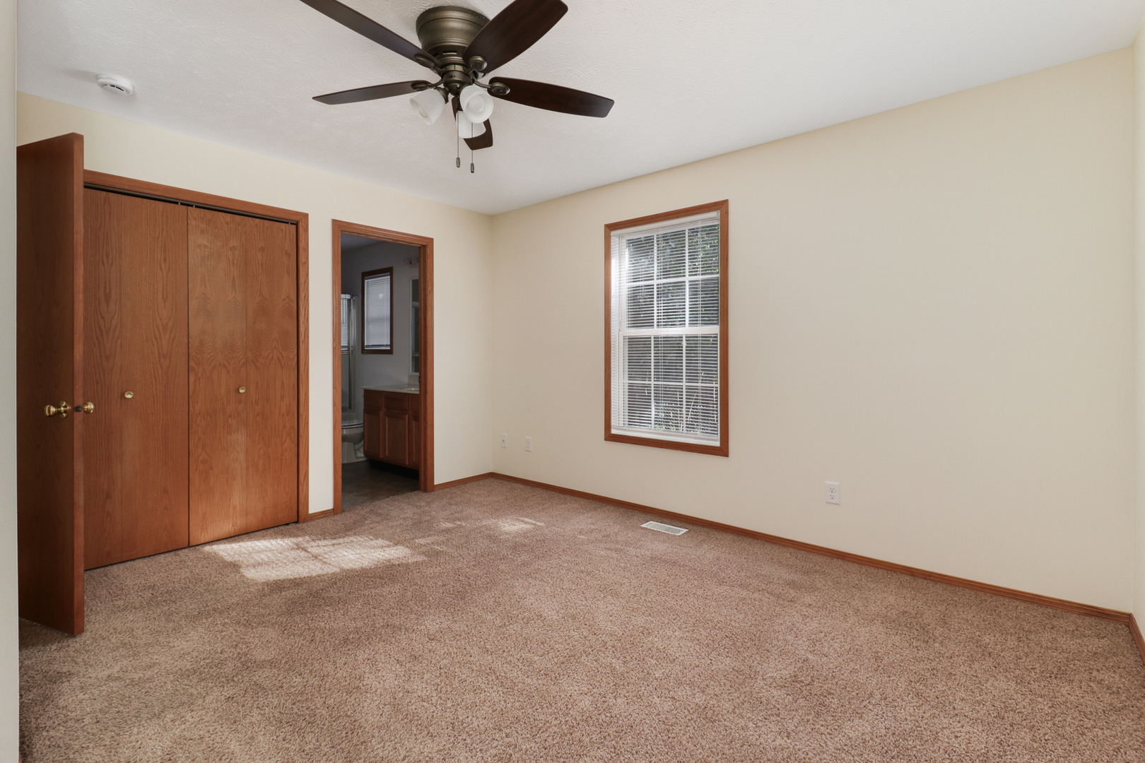 205 Martin Street Normal, IL 61761 - Photo 12 of 32 an empty room with chandelier fan