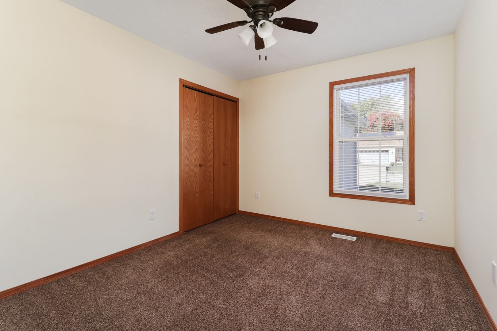 205 Martin Street Normal, IL 61761 - Photo 14 of 32 a view of an empty room with a window