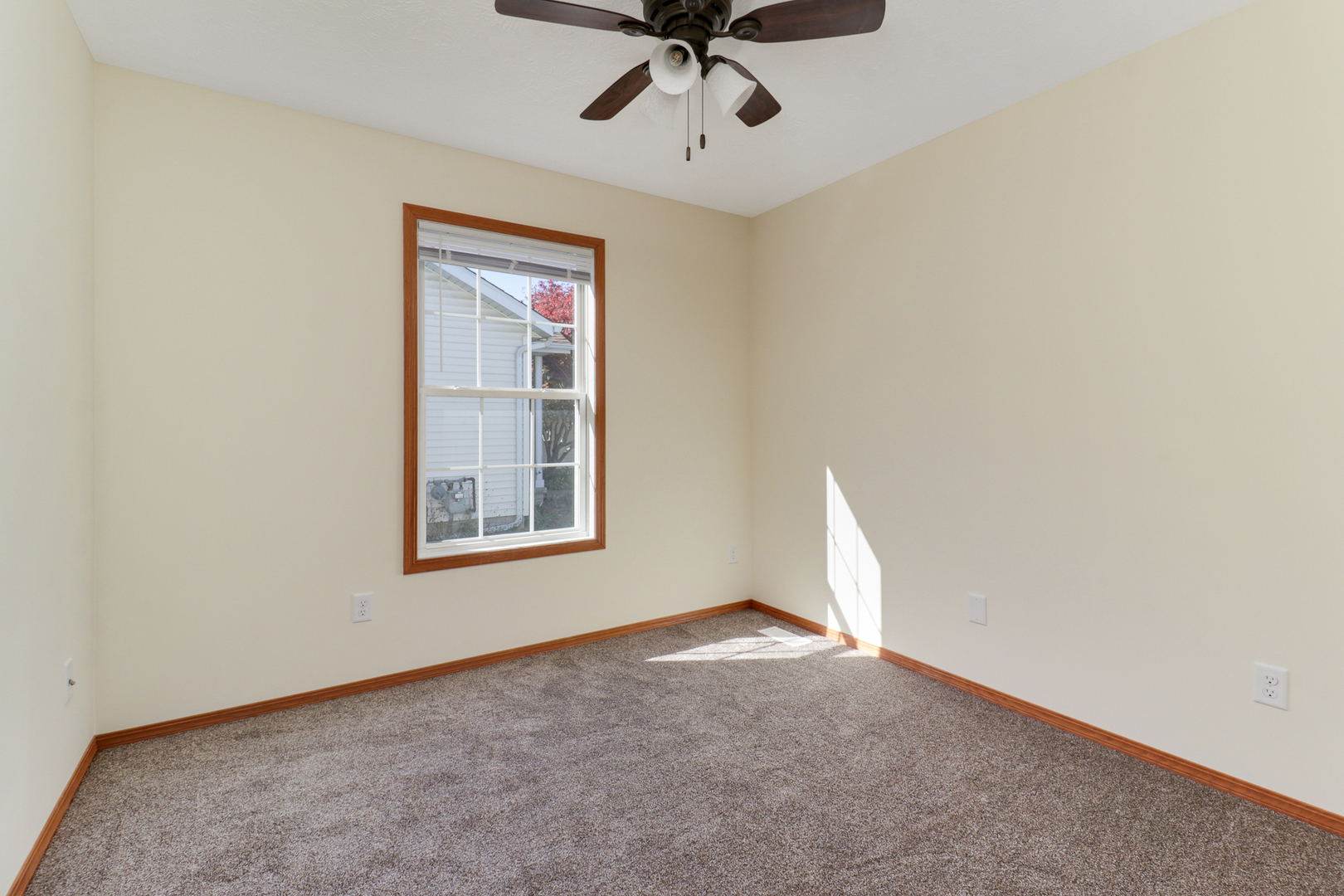 205 Martin Street Normal, IL 61761 - Photo 16 of 32 a view of an empty room with a window