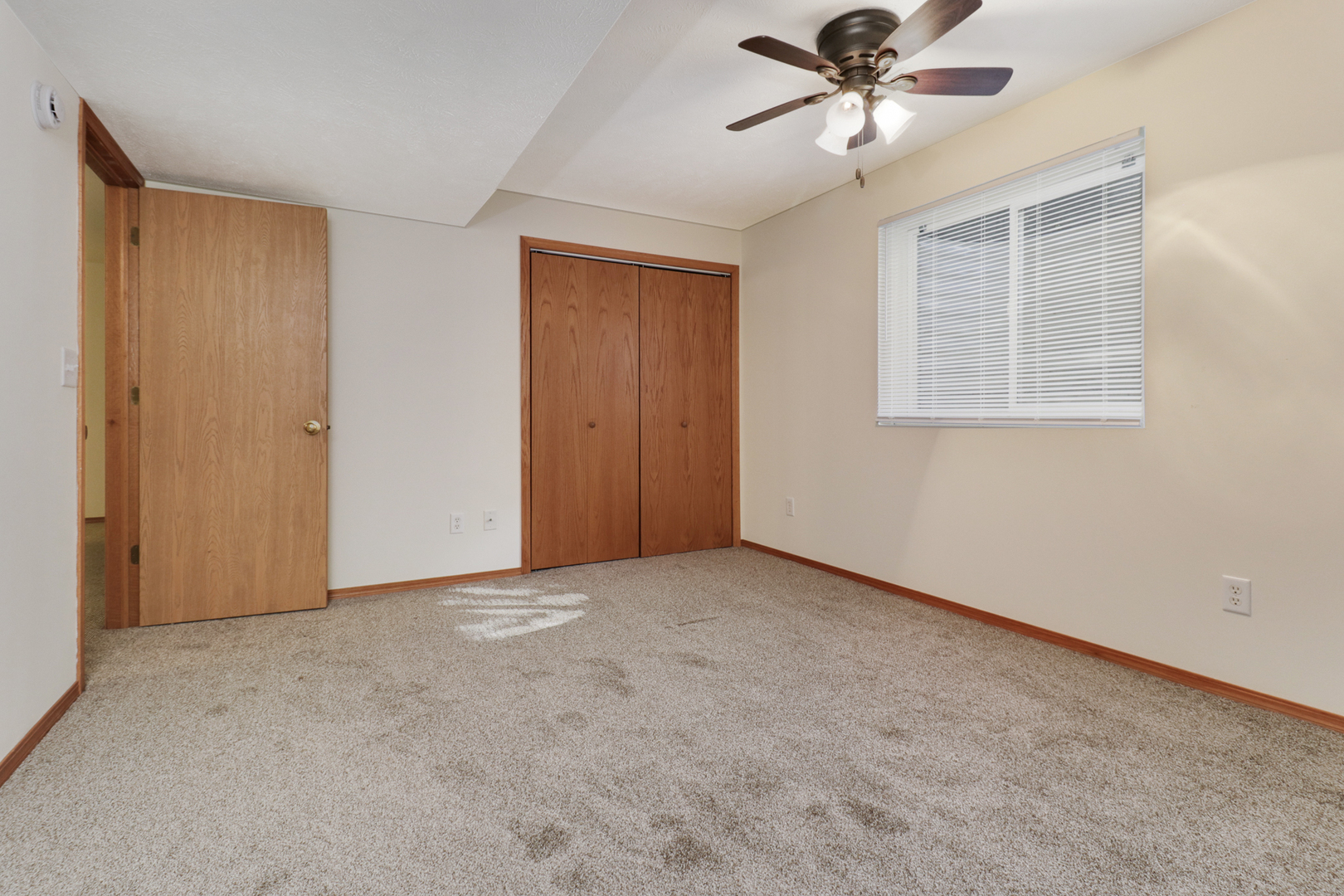 205 Martin Street Normal, IL 61761 - Photo 22 of 32 a view of an empty room with a window