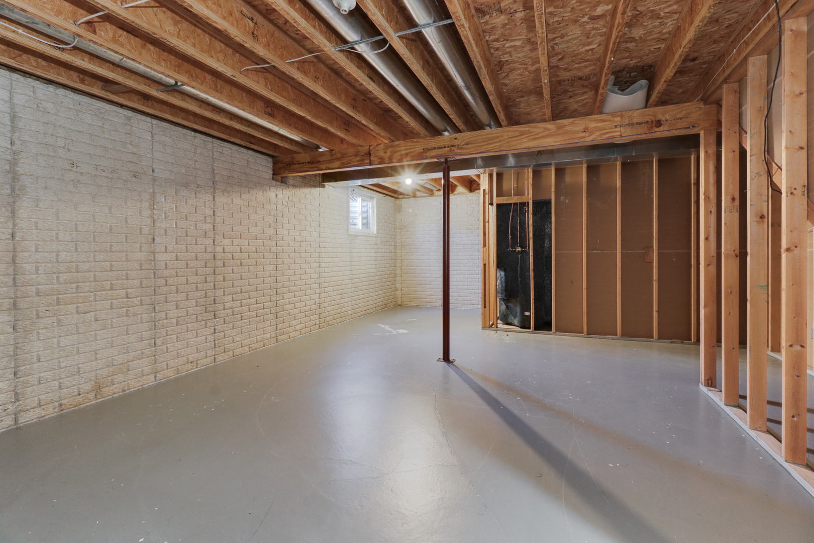 205 Martin Street Normal, IL 61761 - Photo 25 of 32 a view of a room with wooden walls