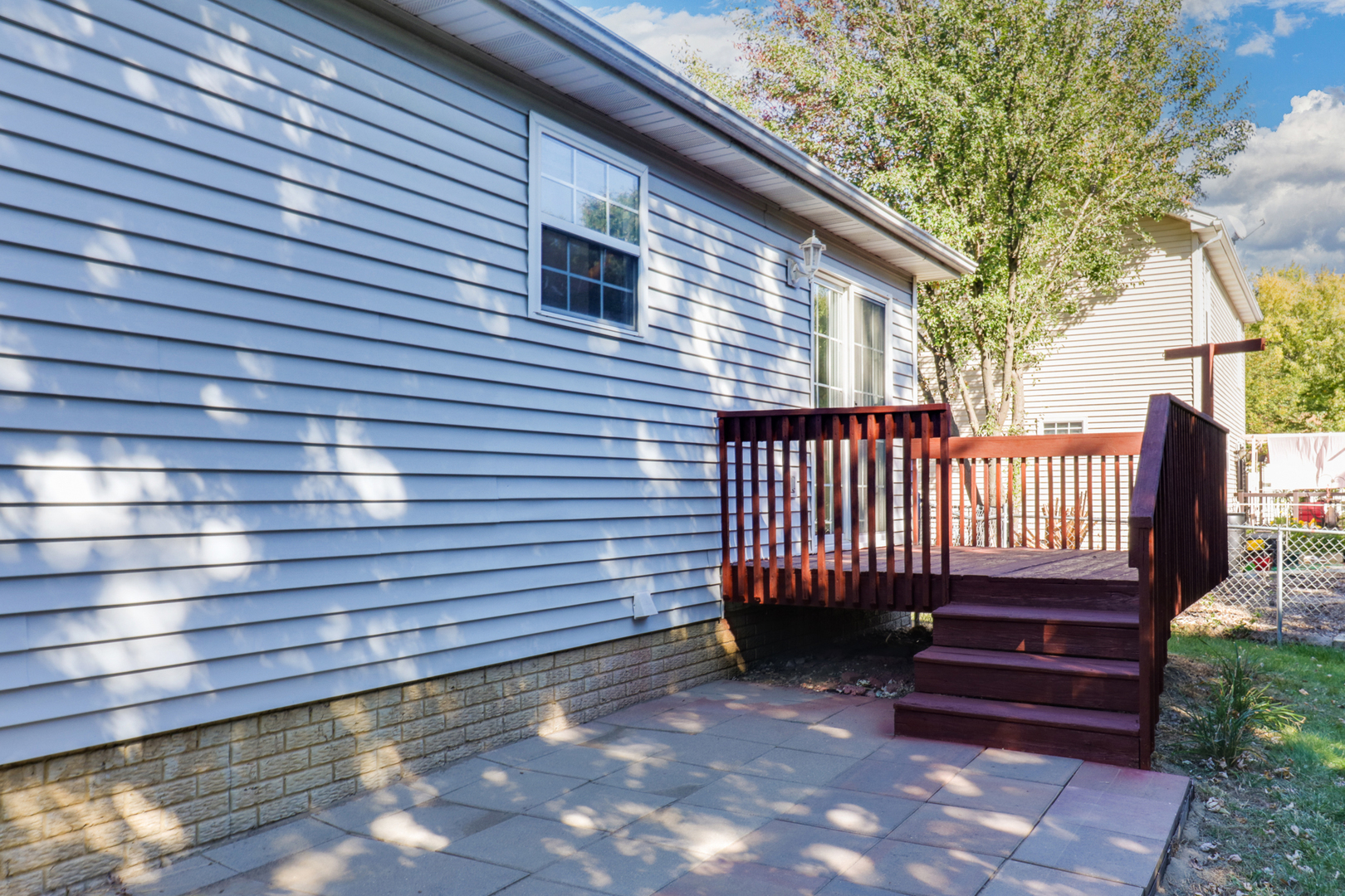 205 Martin Street Normal, IL 61761 - Photo 28 of 32 a view of a backyard with a deck
