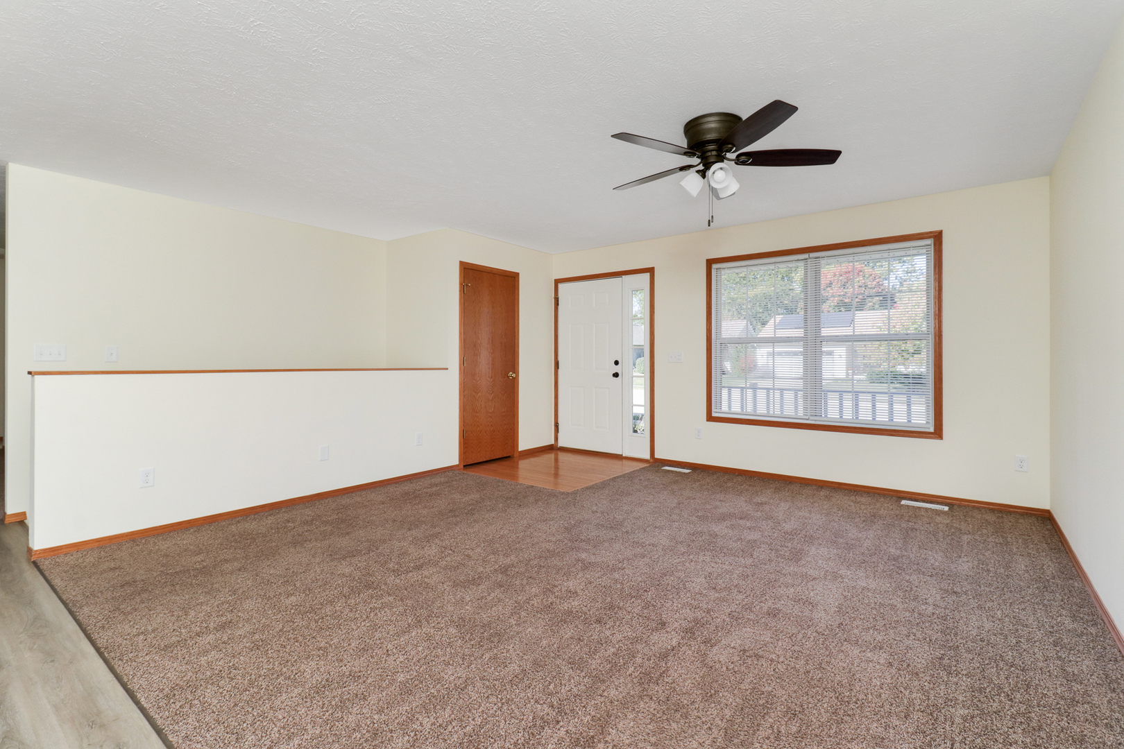 205 Martin Street Normal, IL 61761 - Photo 5 of 32 a view of an empty room with a window