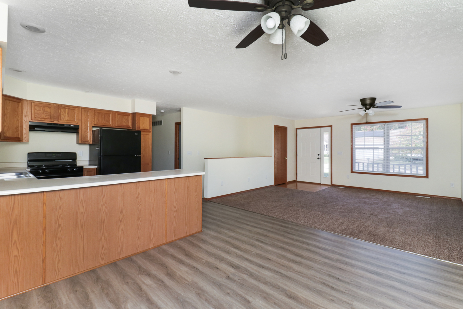 205 Martin Street Normal, IL 61761 - Photo 7 of 32 a living room with furniture and a window