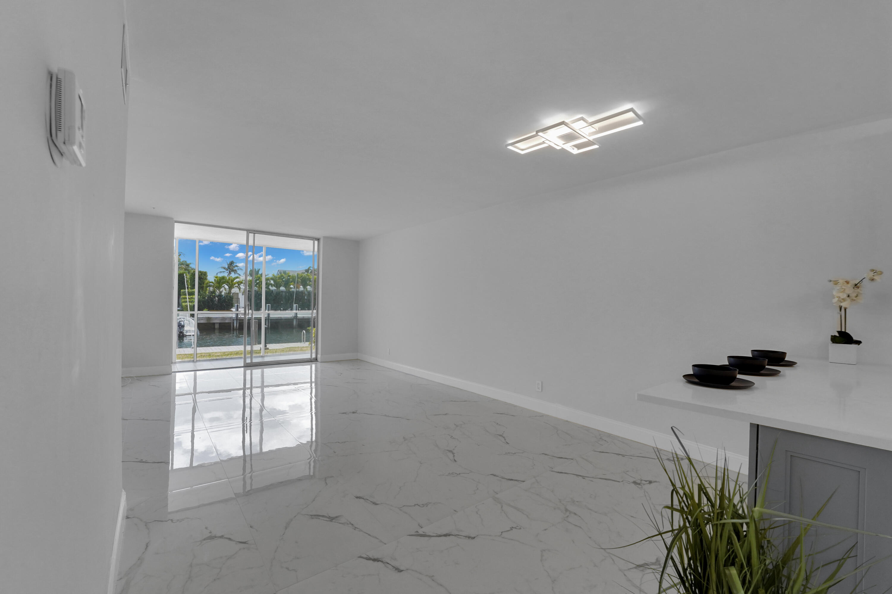 750 Northeast Spanish River Boulevard, Unit 1020 Boca Raton, FL 33431 - Photo 17 of 42 a view of an empty room with a window