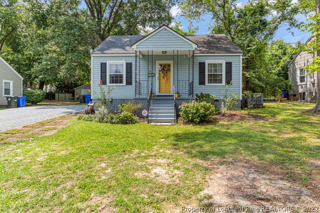 911 Anarine Road Fayetteville, NC 28303 - Photo 2 of 32 a front view of a house with garden
