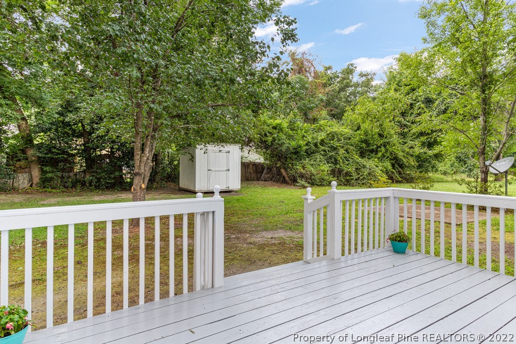 911 Anarine Road Fayetteville, NC 28303 - Photo 23 of 32 a view of wooden deck and a yard