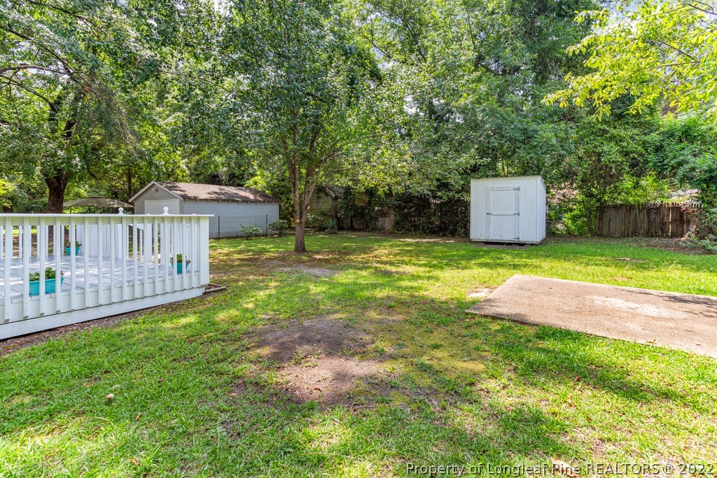911 Anarine Road Fayetteville, NC 28303 - Photo 25 of 32 a view of a house with backyard and sitting area