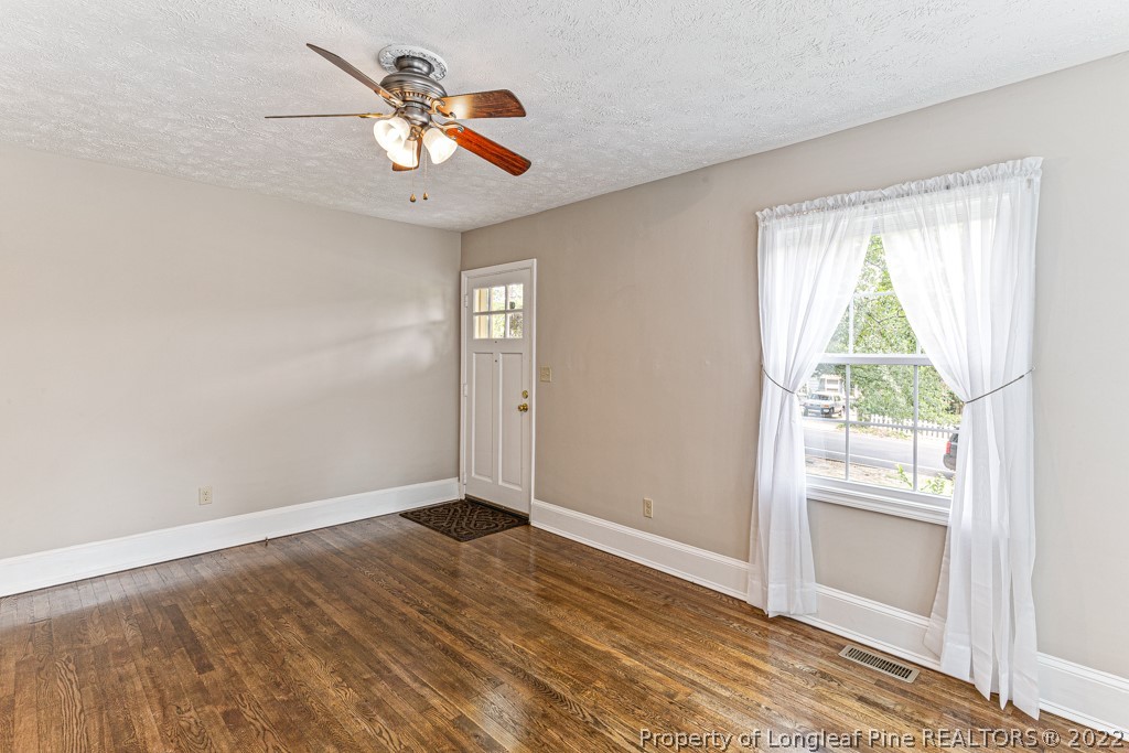 911 Anarine Road Fayetteville, NC 28303 - Photo 7 of 32 a view of an empty room with a window