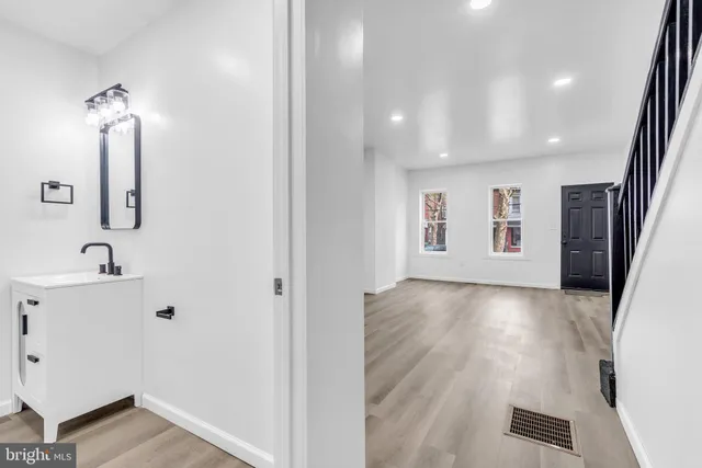 a view of a hallway with front door