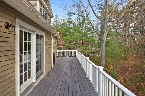 a view of balcony and yard