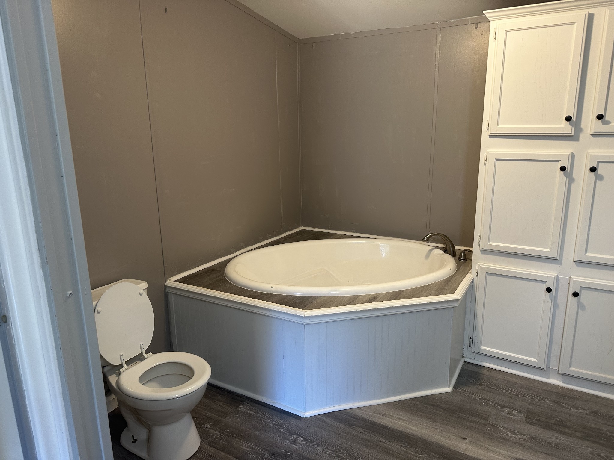 6409 Roy Pearson Road Springfield, TN 37172 - Photo 20 of 22 a white toilet sitting in a bathroom