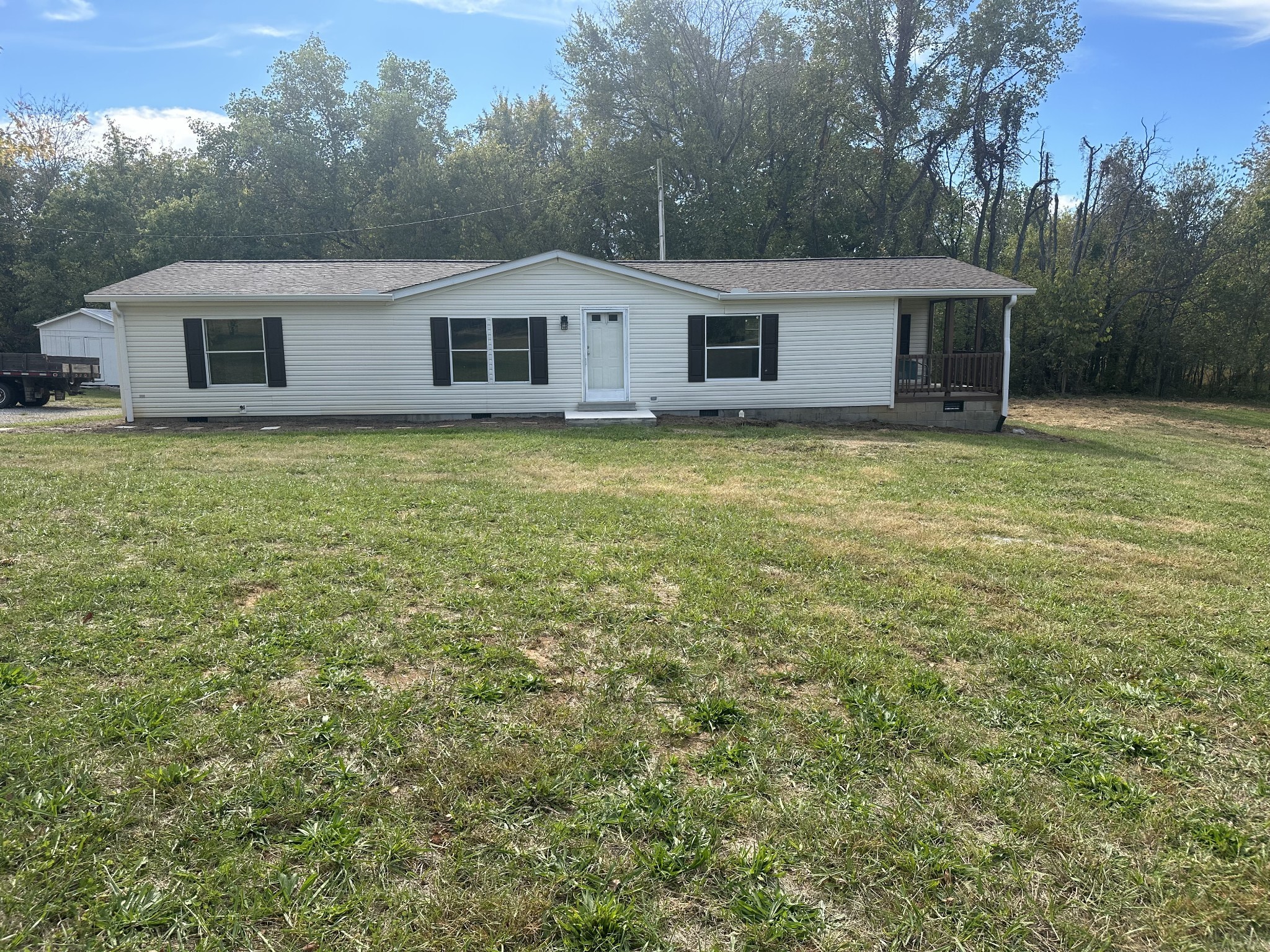 6409 Roy Pearson Road Springfield, TN 37172 - Photo 3 of 22 a view of a house with a backyard