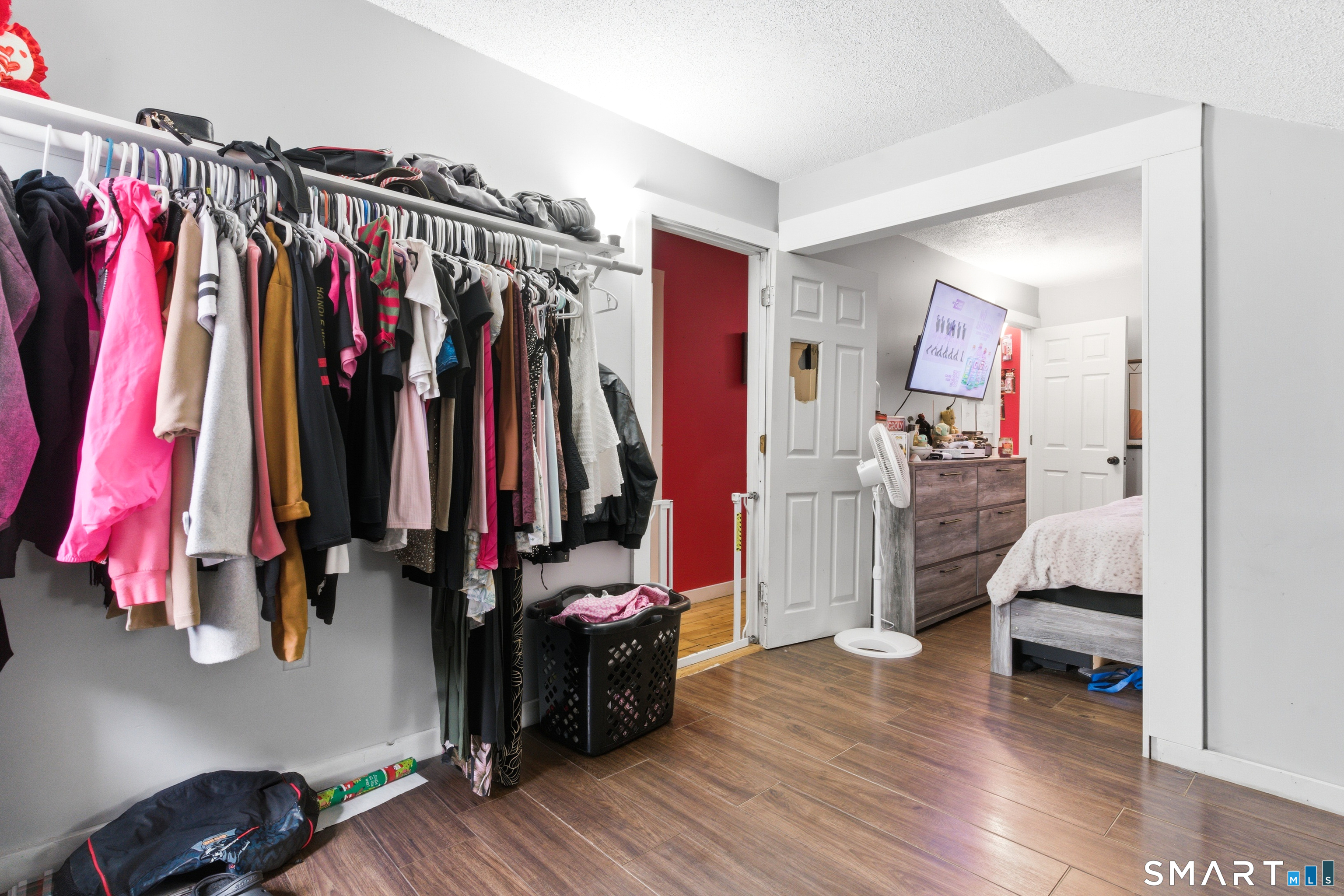 36 Church Street Killingly, CT 06241 - Photo 31 of 39 a view of walk in closet with clothes and shoes