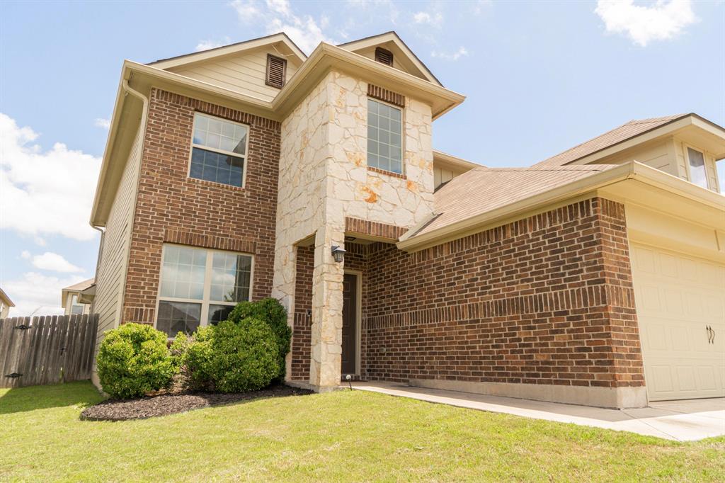 2716 Beutel Road Lorena, TX 76655 - Photo 2 of 39 a front view of a house with a yard