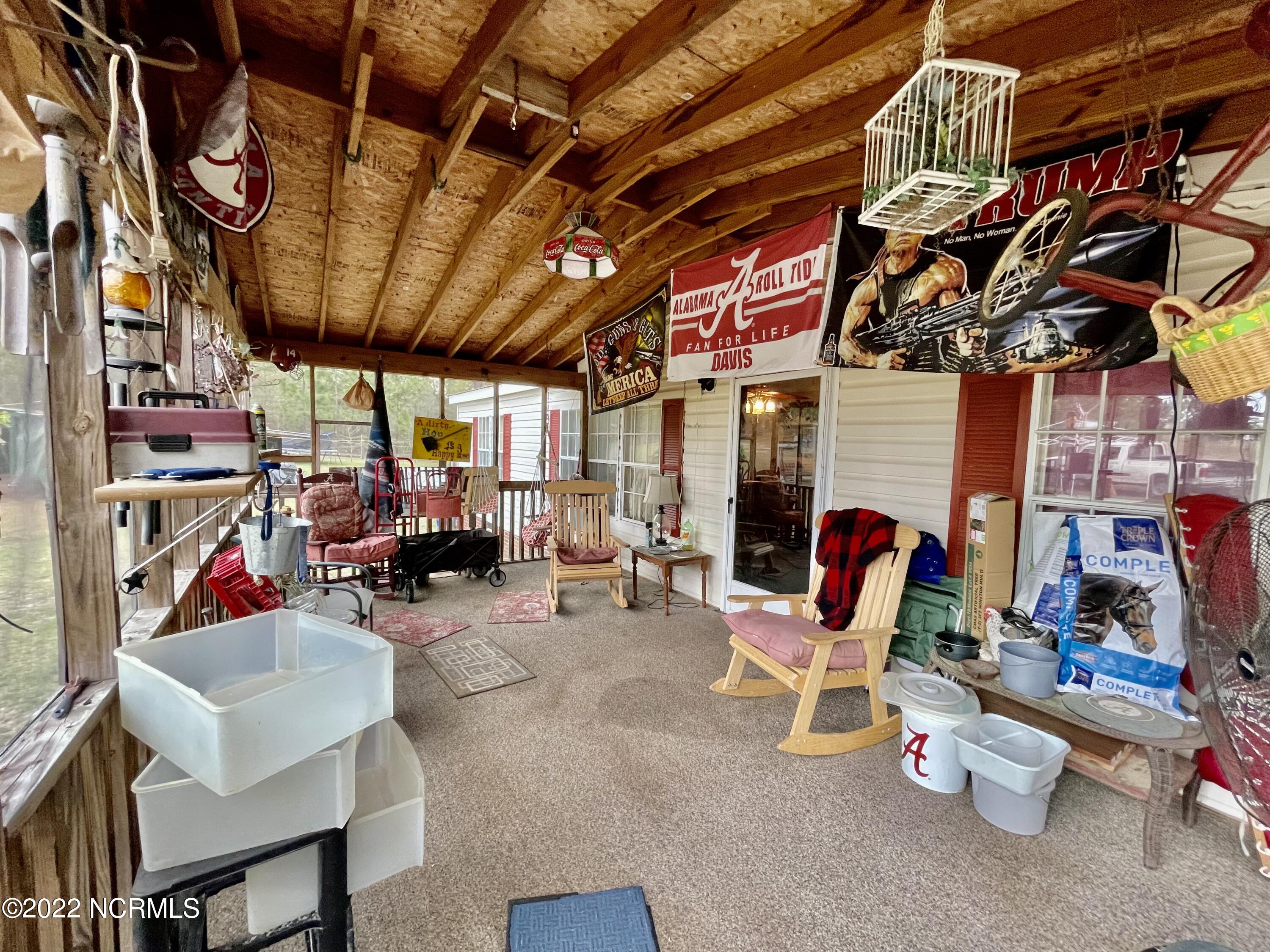 125 Greenbriar Lane Rockingham, NC 28379 - Photo 12 of 44 Screened in porch