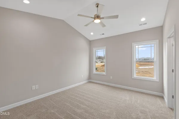 a view of a livingroom with a ceiling fan