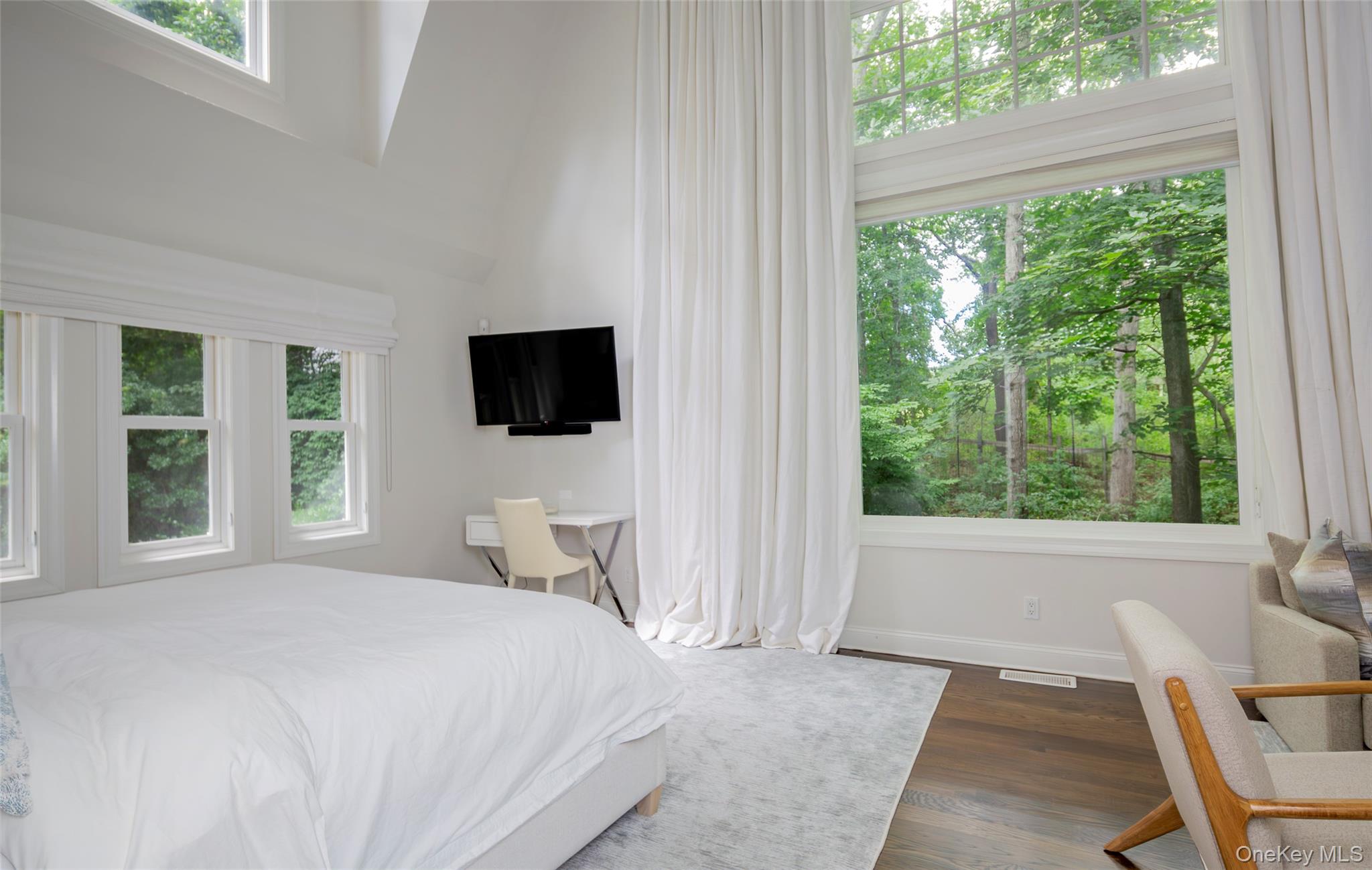 652 Noyac Path Water Mill, NY 11976 - Photo 17 of 41 Bedroom featuring baseboards, dark wood-style floors, and visible vents