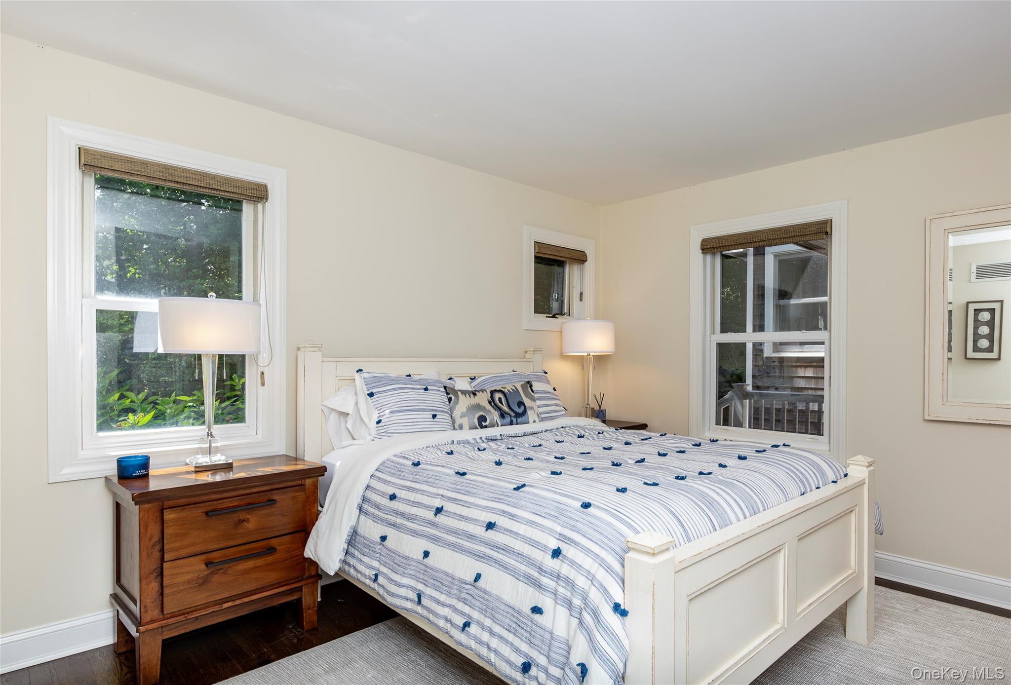 652 Noyac Path Water Mill, NY 11976 - Photo 18 of 41 Bedroom featuring dark wood finished floors and baseboards