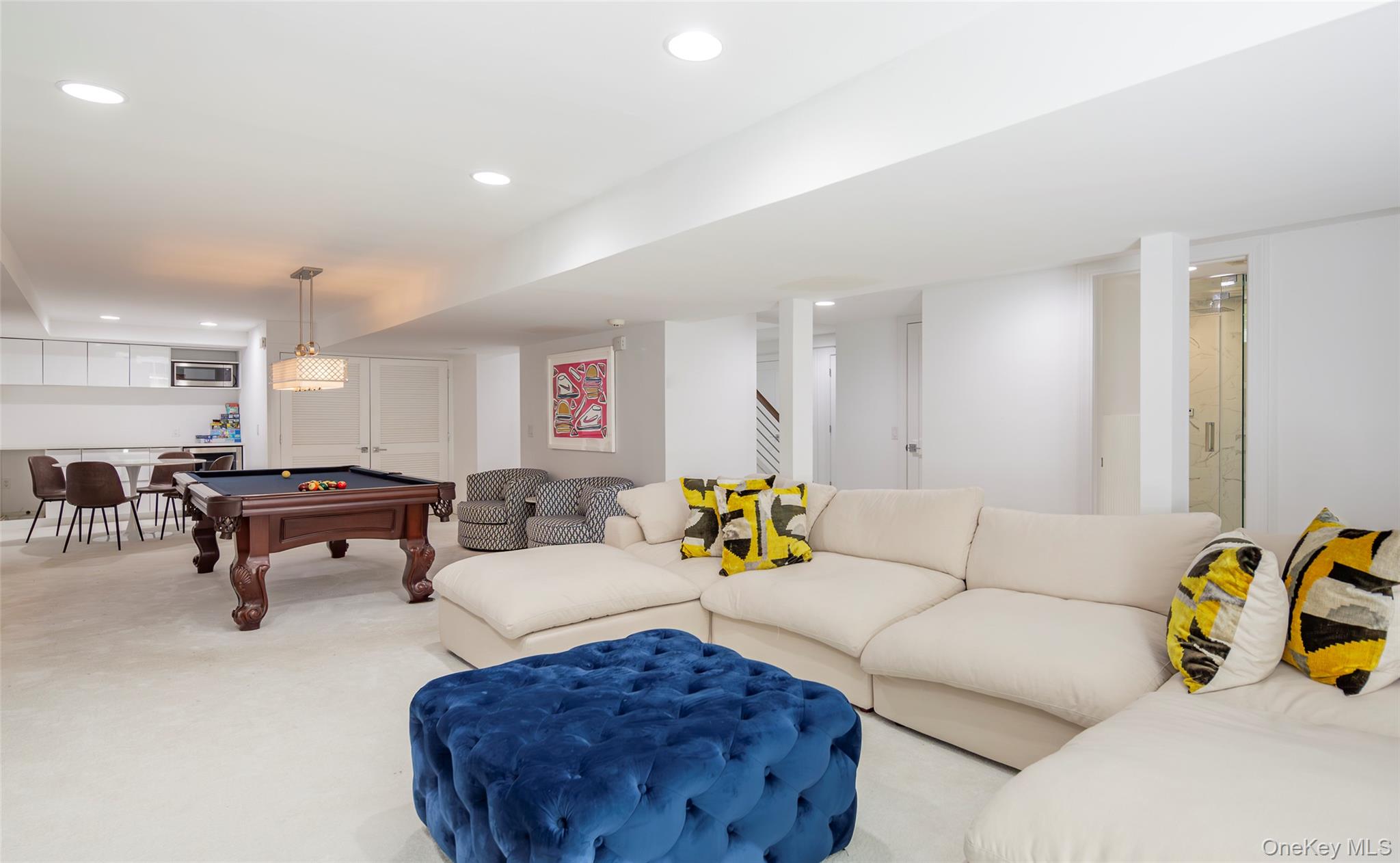 652 Noyac Path Water Mill, NY 11976 - Photo 29 of 41 Living room with light carpet, pool table, stairs, and recessed lighting