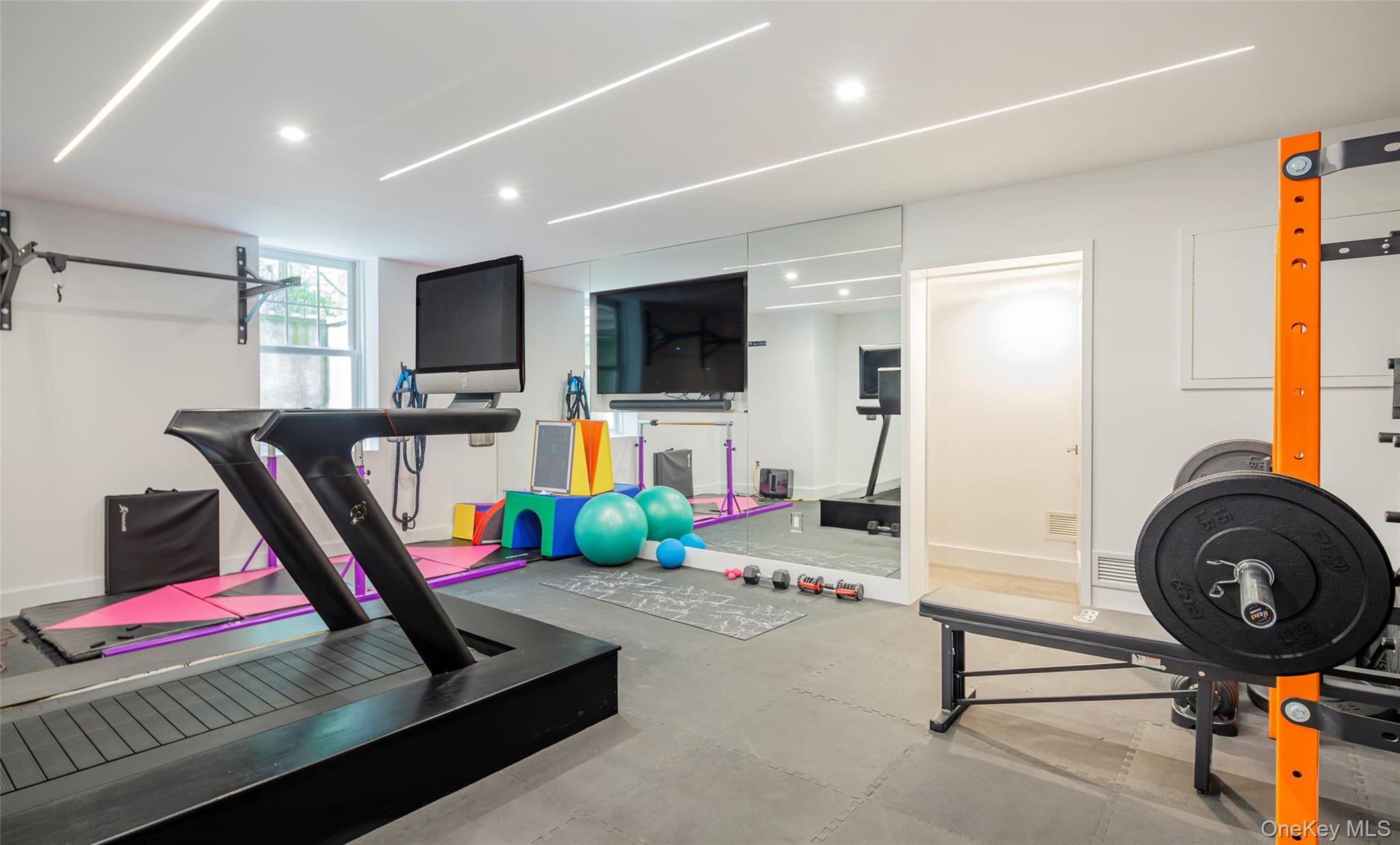 652 Noyac Path Water Mill, NY 11976 - Photo 33 of 41 Exercise area with baseboards and recessed lighting