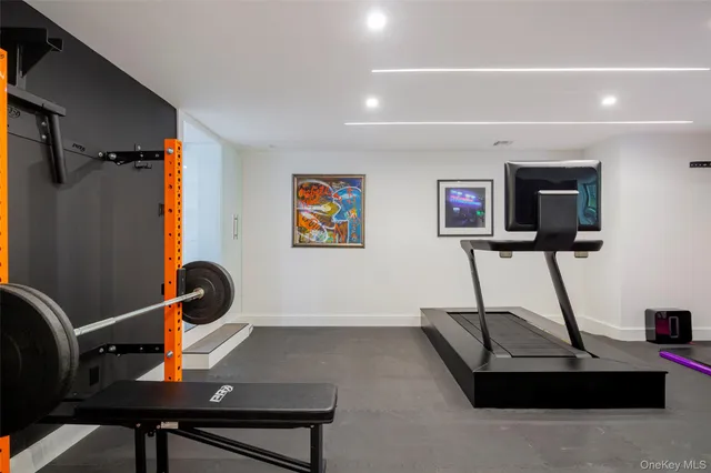 a view of a workspace with furniture