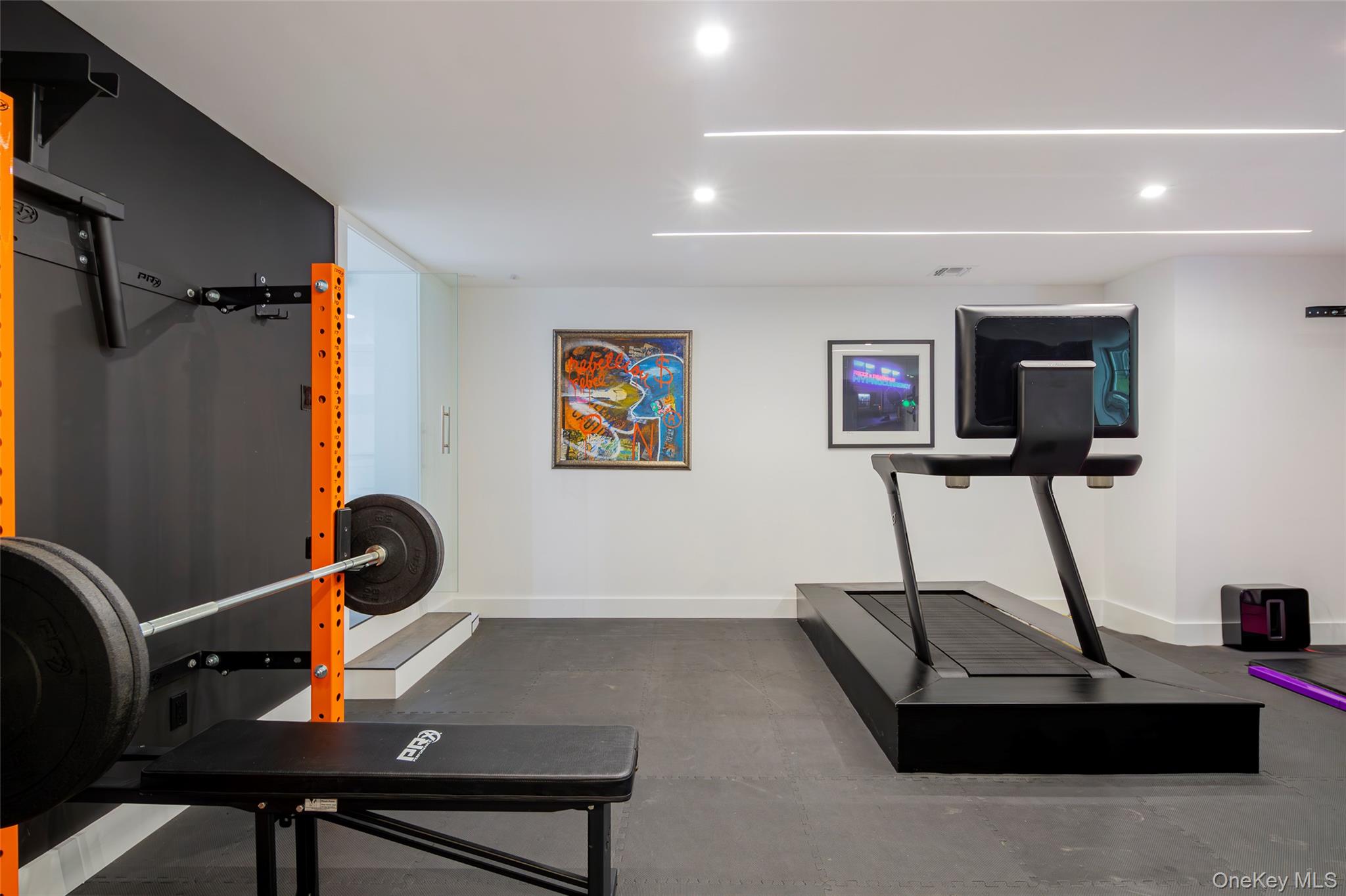 652 Noyac Path Water Mill, NY 11976 - Photo 34 of 41 Workout area with baseboards and recessed lighting