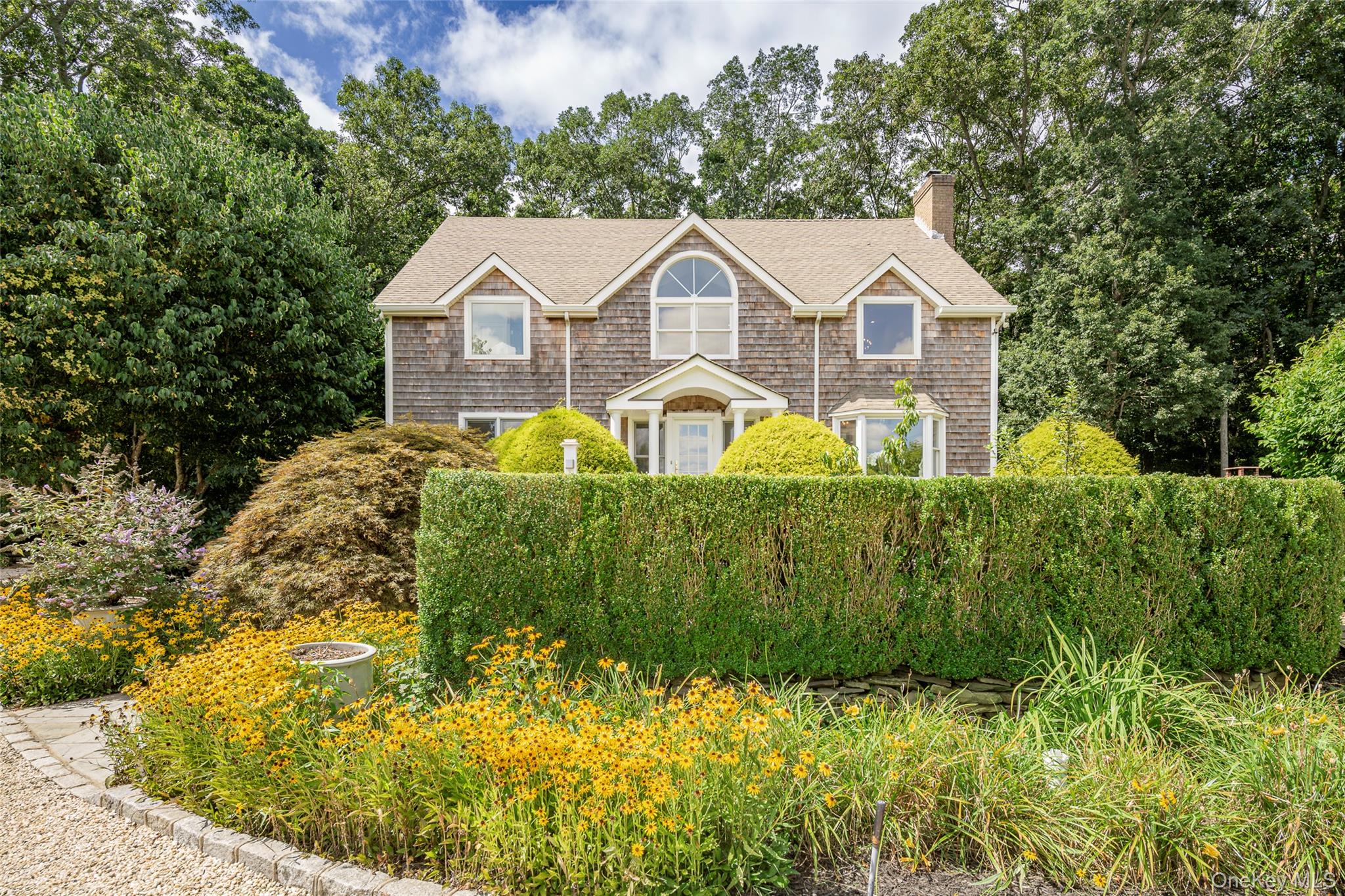 652 Noyac Path Water Mill, NY 11976 - Photo 35 of 41 Shingle-style home with a chimney and a shingled roof