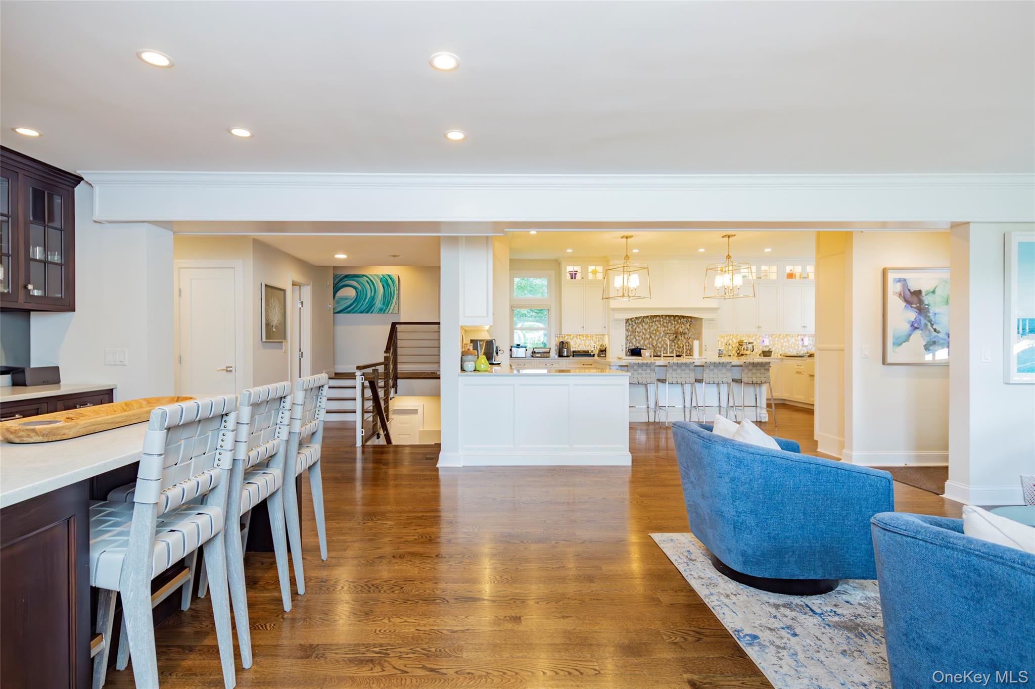 652 Noyac Path Water Mill, NY 11976 - Photo 10 of 41 Living area featuring ornamental molding, dark wood-style floors, a chandelier, and recessed lighting