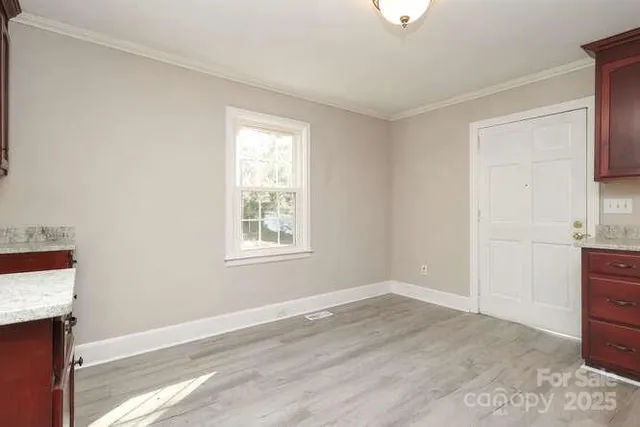 an empty room with windows