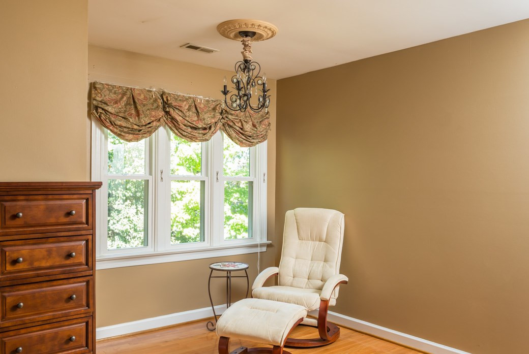 5215 Coffee Tree Drive Raleigh, NC 27613 - Photo 7 of 25 The master suite includes a sitting area large enough for two! Master Bedroom