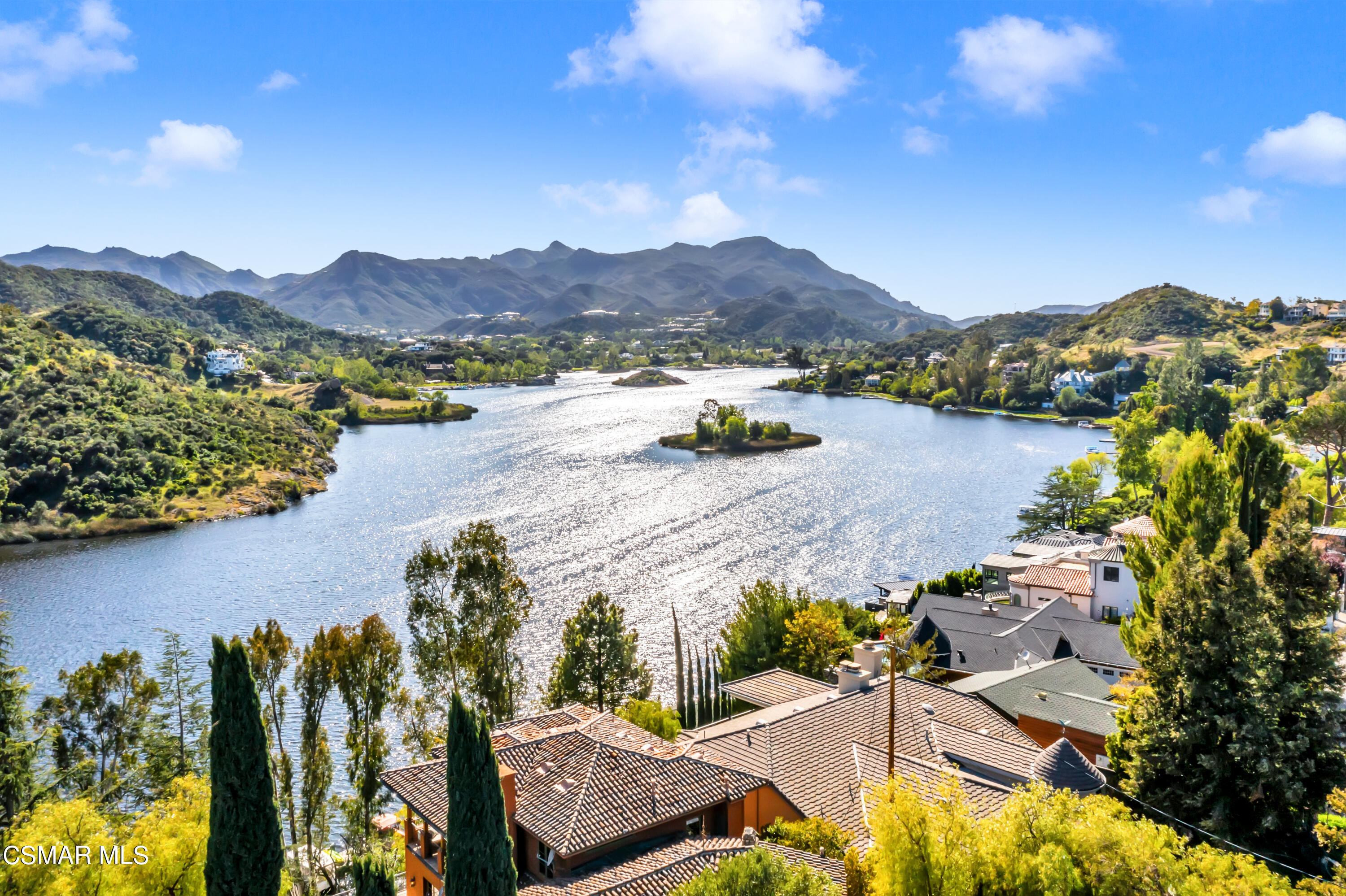 an aerial view of residential house with an outdoor space