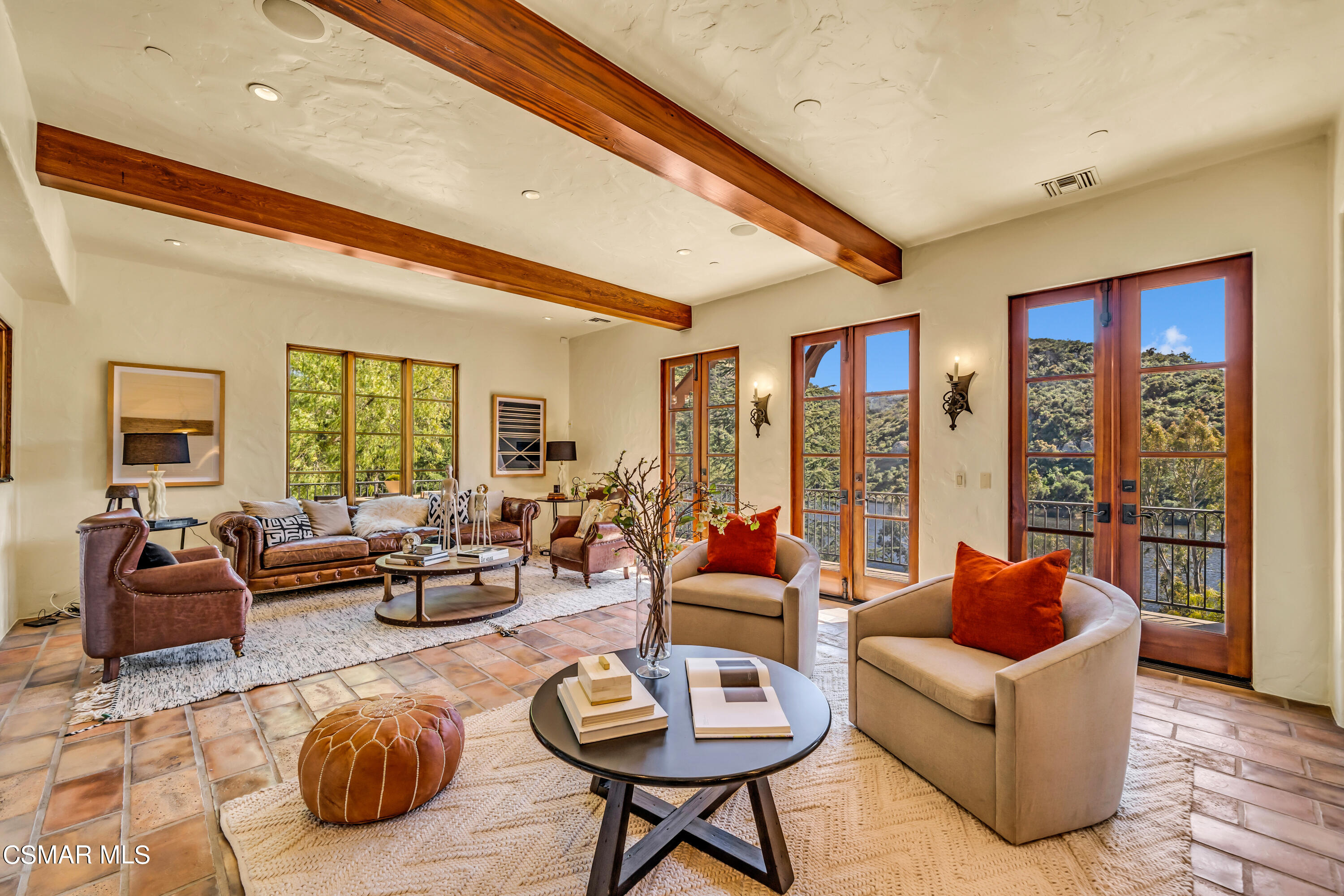 1999 Trentham Road Lake Sherwood, CA 91361 - Photo 12 of 61 a living room with furniture a rug potted plant and a large window