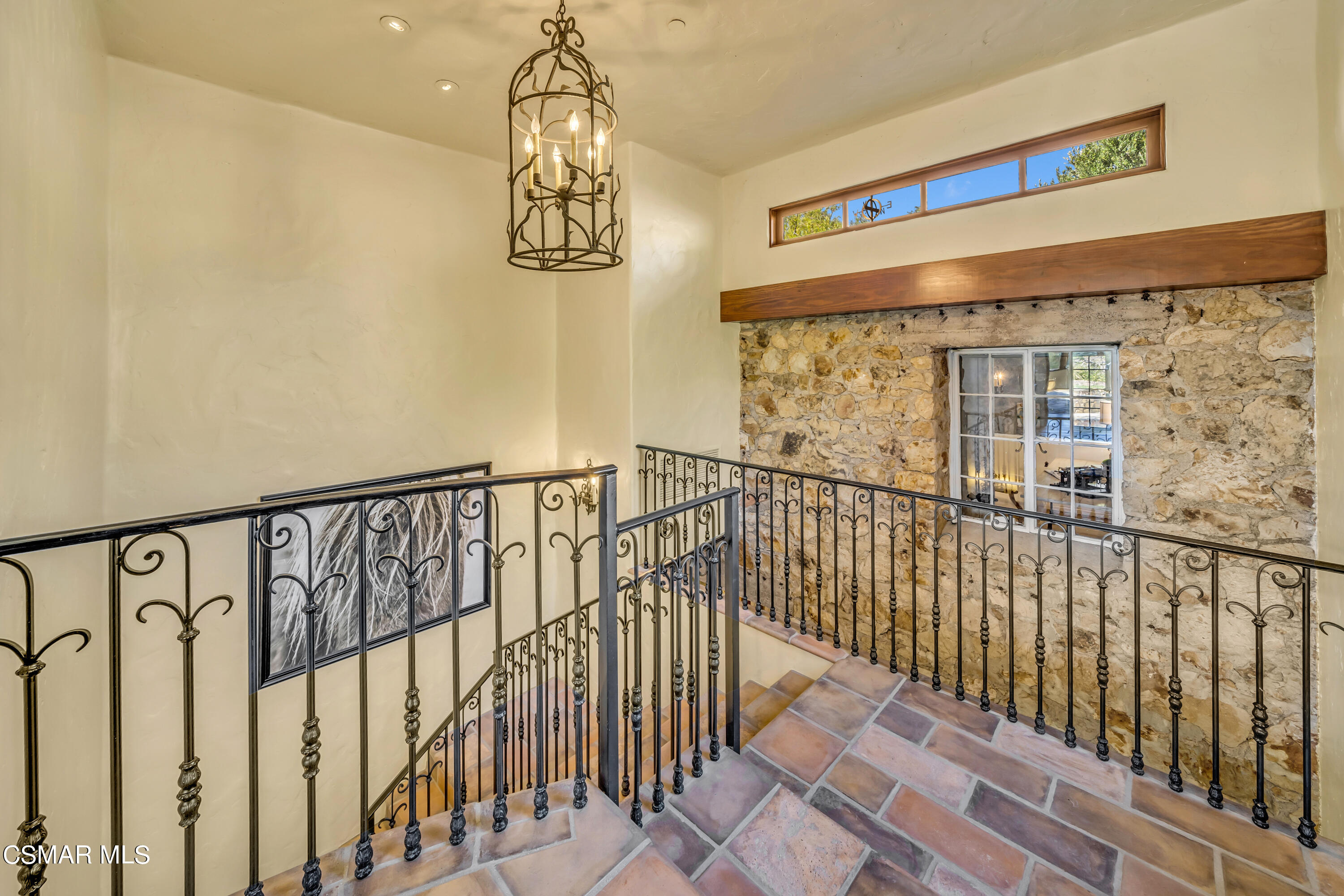 1999 Trentham Road Lake Sherwood, CA 91361 - Photo 21 of 61 a view of staircase with railing and a chandelier