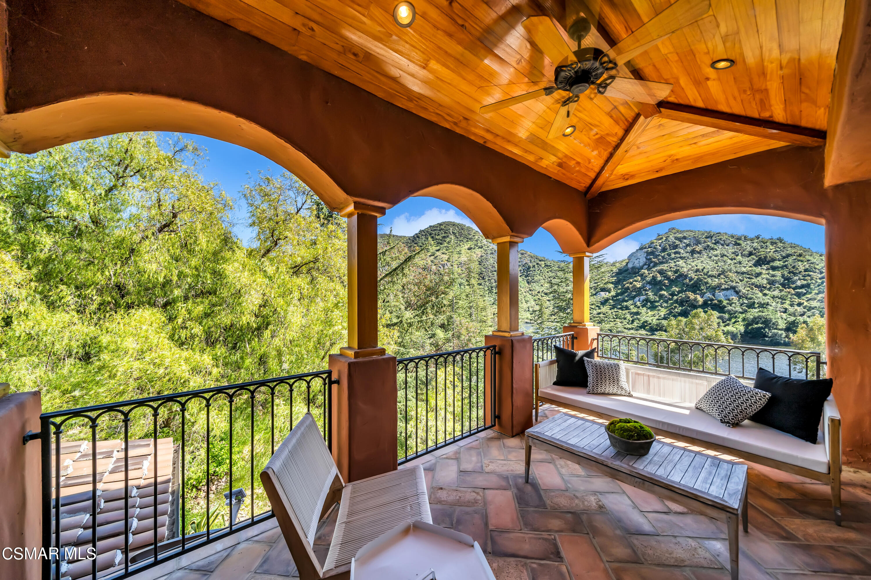 1999 Trentham Road Lake Sherwood, CA 91361 - Photo 27 of 61 a balcony with wooden floor and outdoor seating