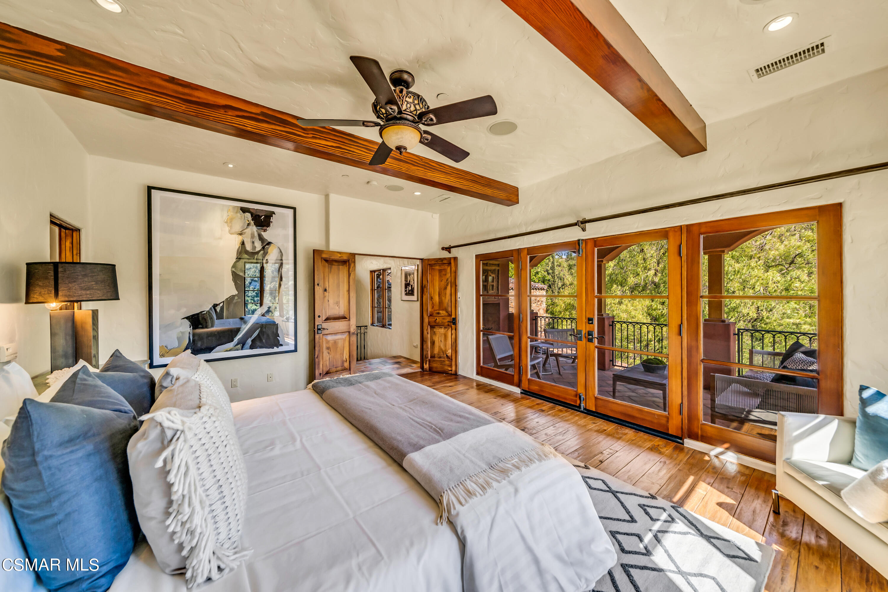 1999 Trentham Road Lake Sherwood, CA 91361 - Photo 28 of 61 a large bedroom with a large bed and a large window