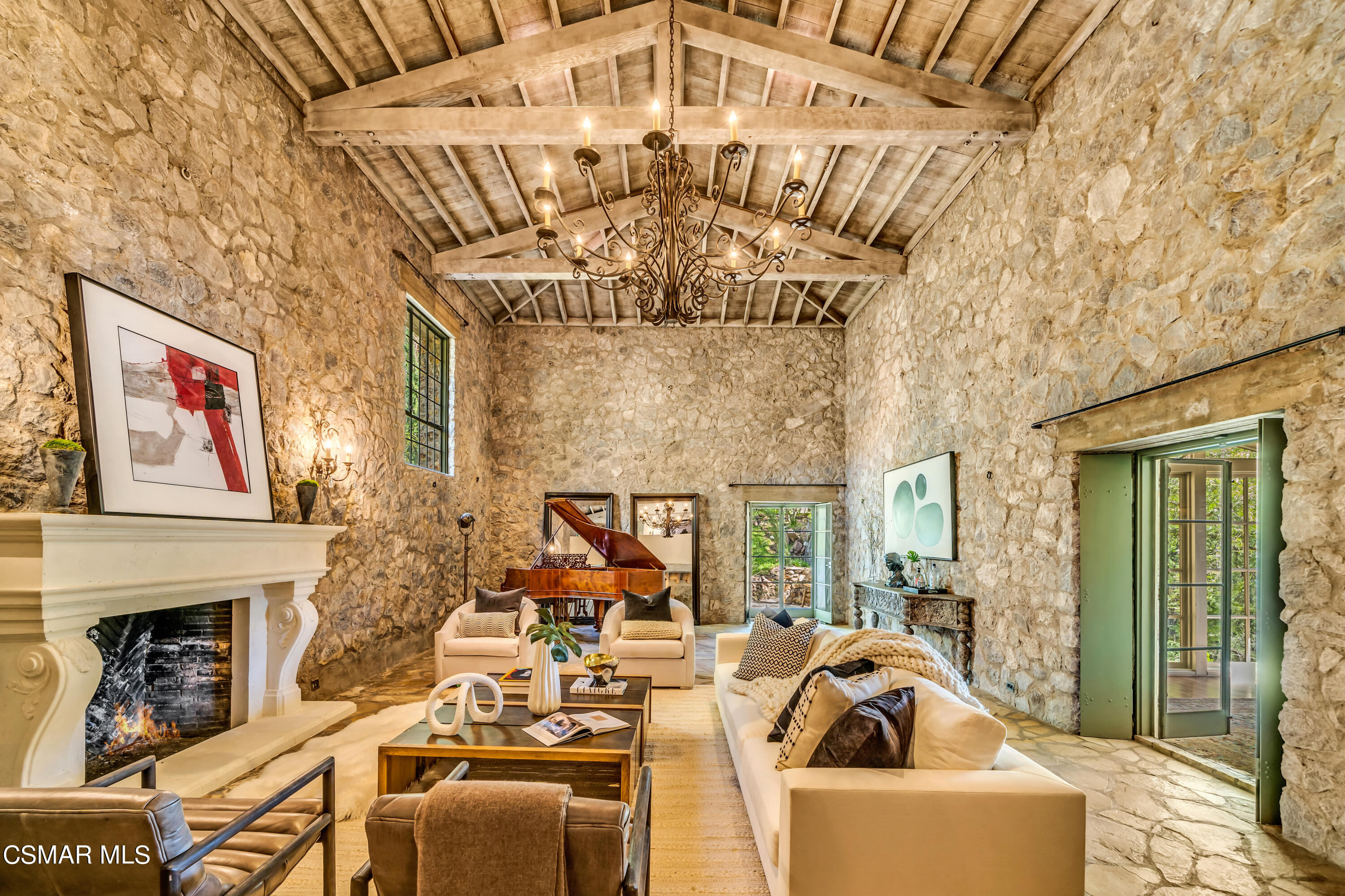 1999 Trentham Road Lake Sherwood, CA 91361 - Photo 3 of 61 a living room with fireplace furniture and a chandelier