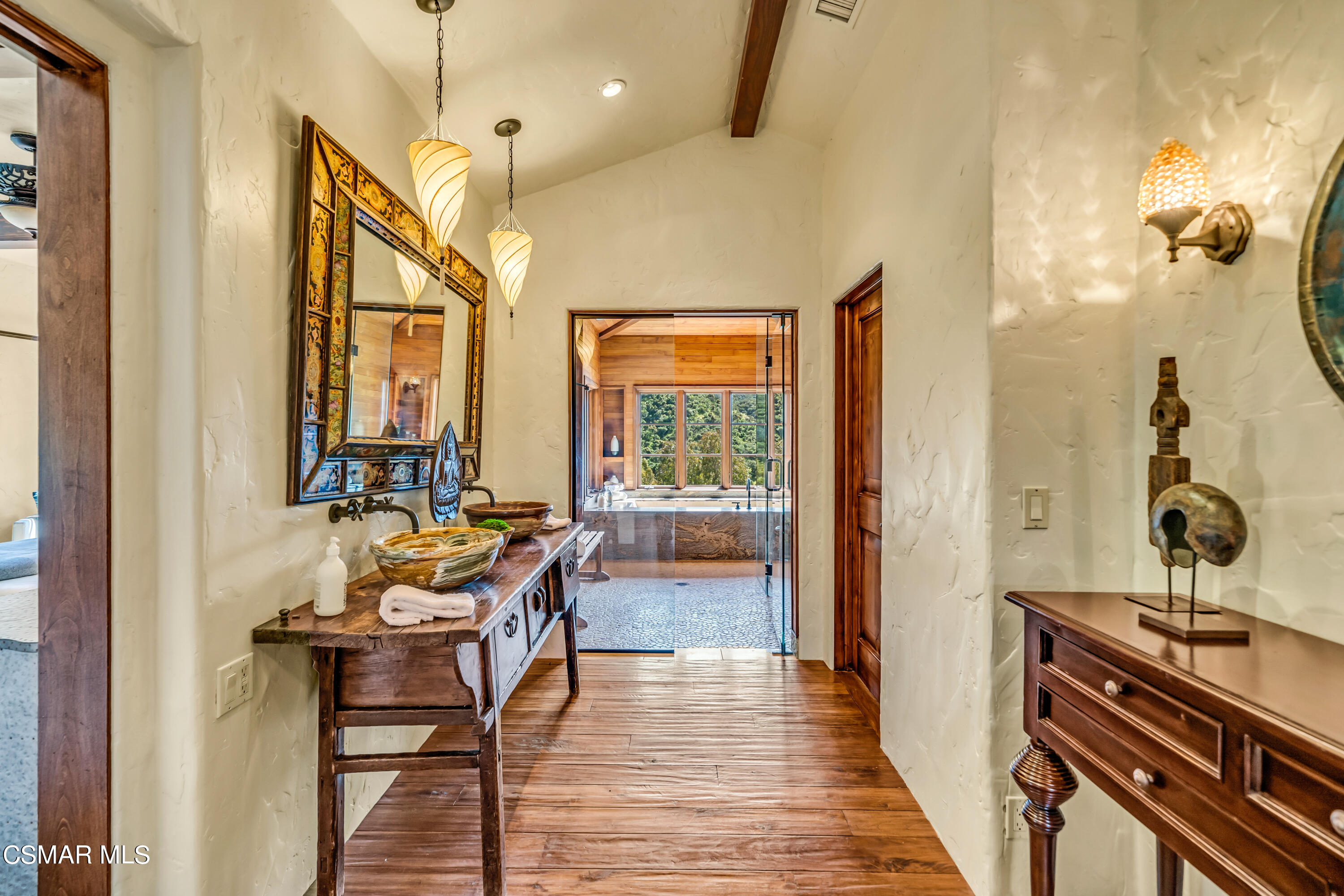 1999 Trentham Road Lake Sherwood, CA 91361 - Photo 32 of 61 a view of a hallway with wooden floor and windows