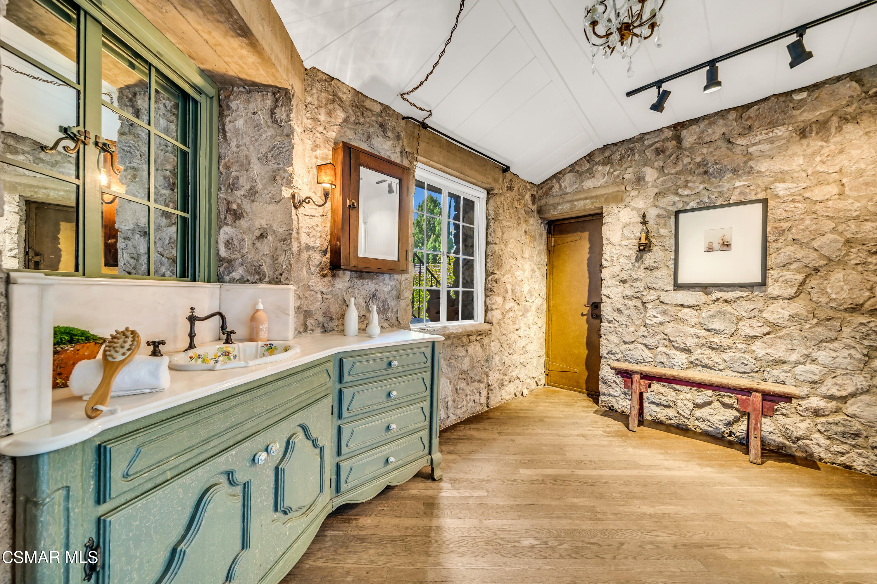 1999 Trentham Road Lake Sherwood, CA 91361 - Photo 34 of 61 a bathroom with a sink and a mirror