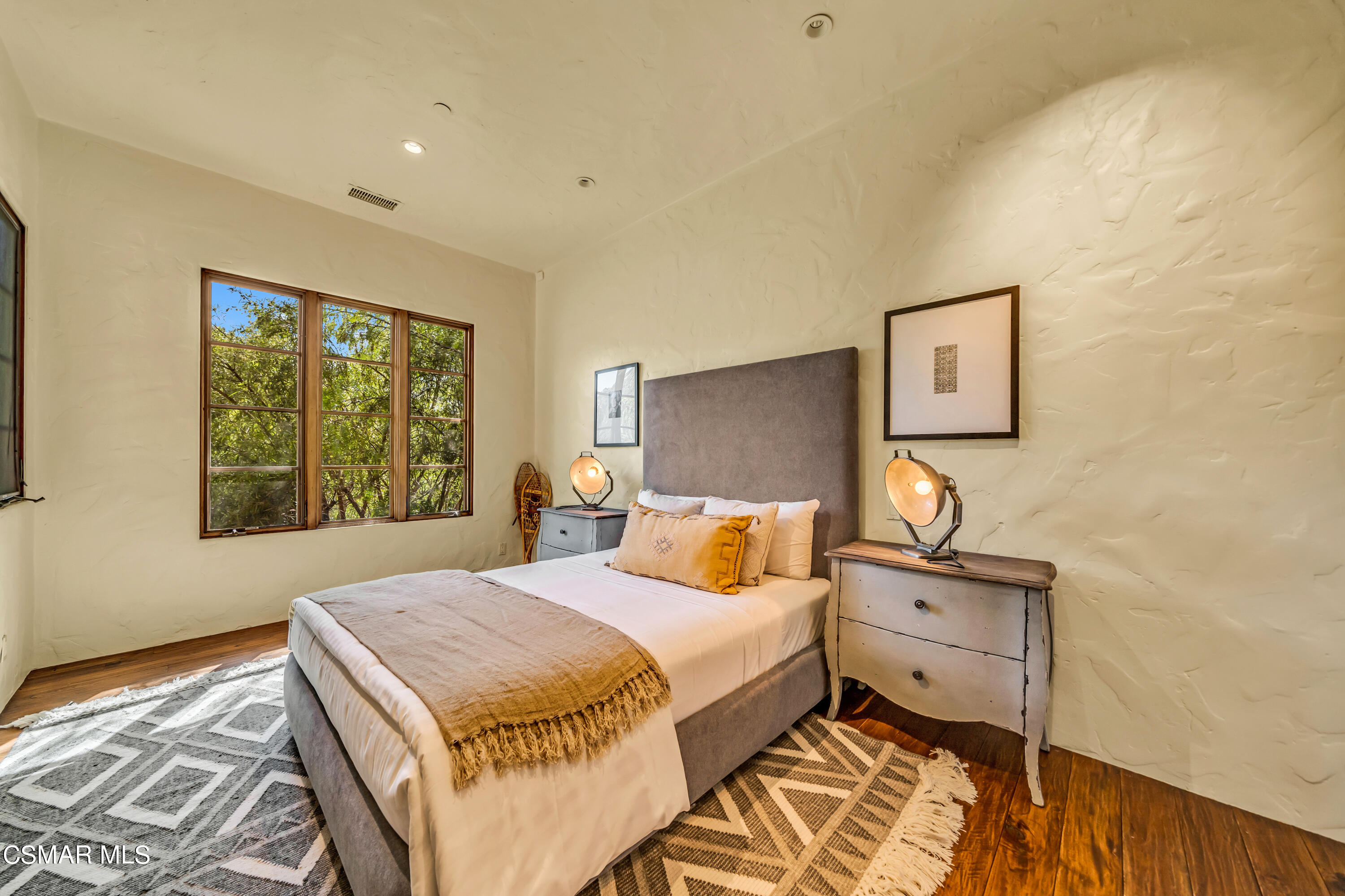 1999 Trentham Road Lake Sherwood, CA 91361 - Photo 38 of 61 a bedroom with a bed and a painting on the wall