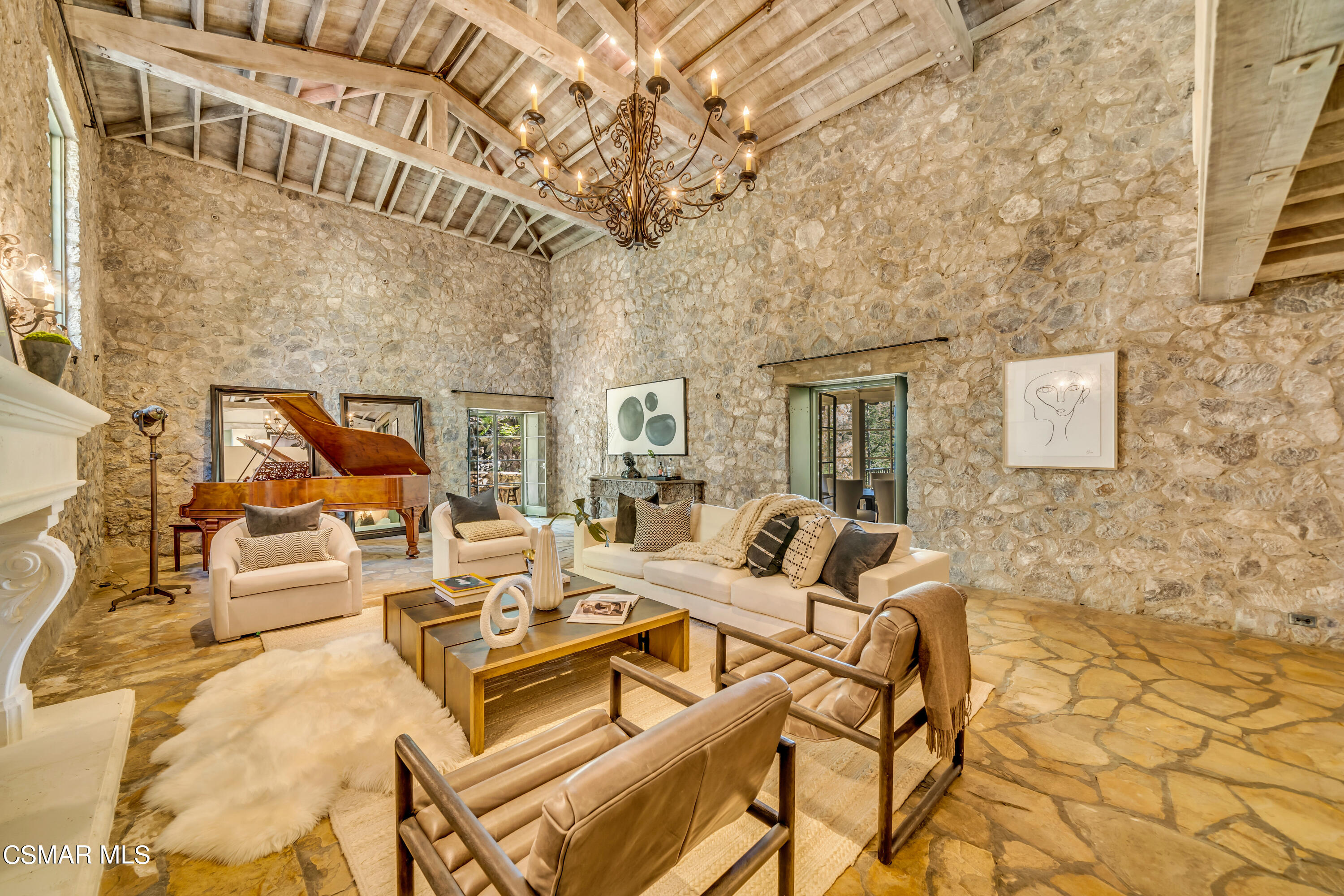 1999 Trentham Road Lake Sherwood, CA 91361 - Photo 4 of 61 a view of a patio with couches under an umbrella