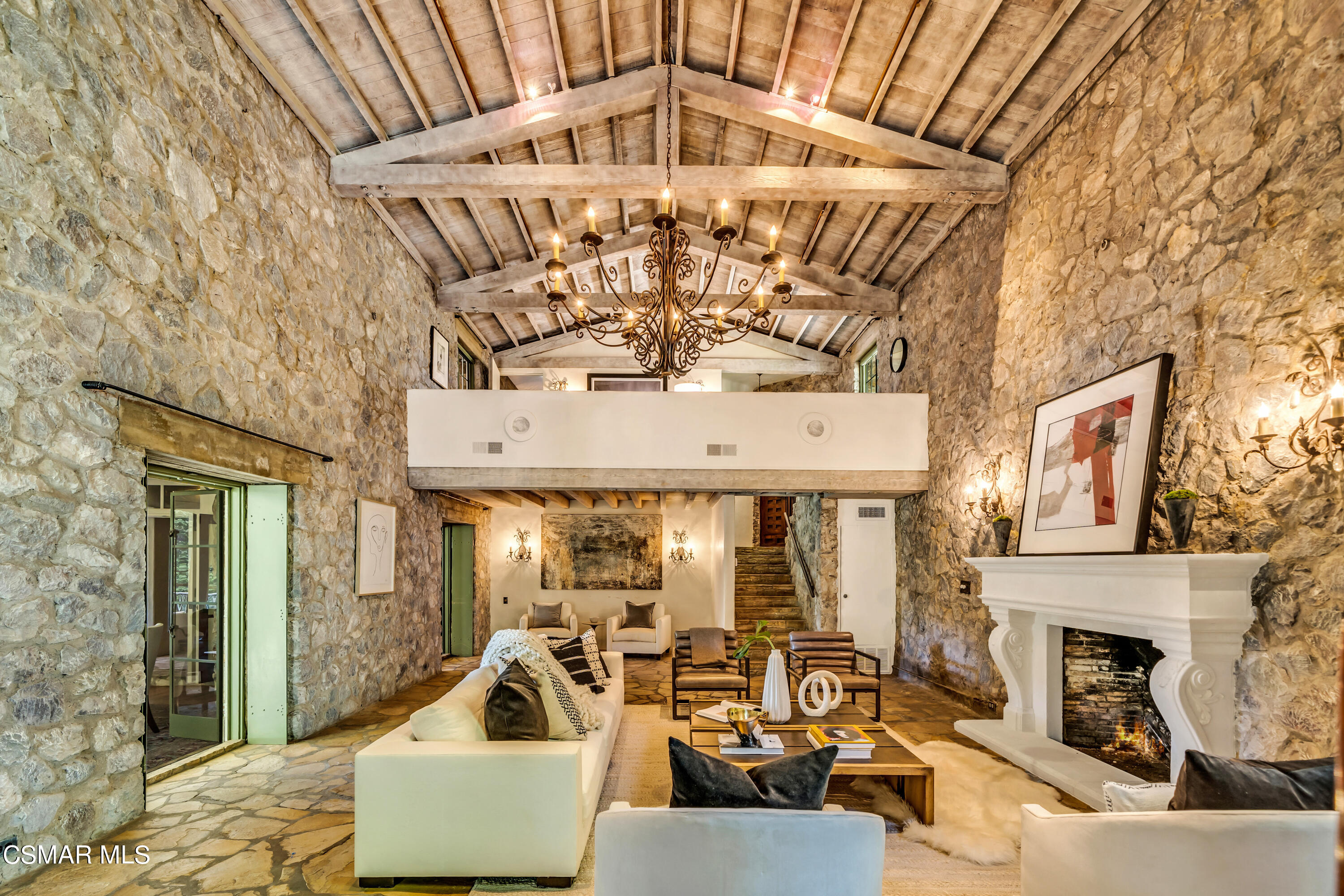 1999 Trentham Road Lake Sherwood, CA 91361 - Photo 5 of 61 a living room with fireplace furniture and a chandelier