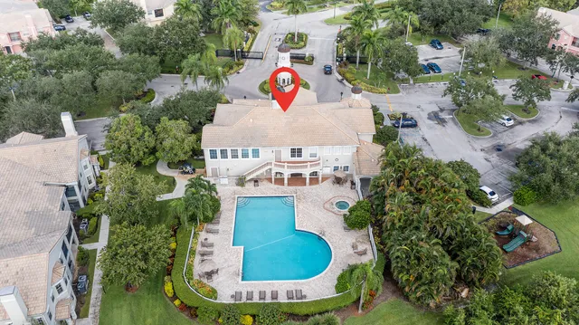 an aerial view of a house with outdoor space