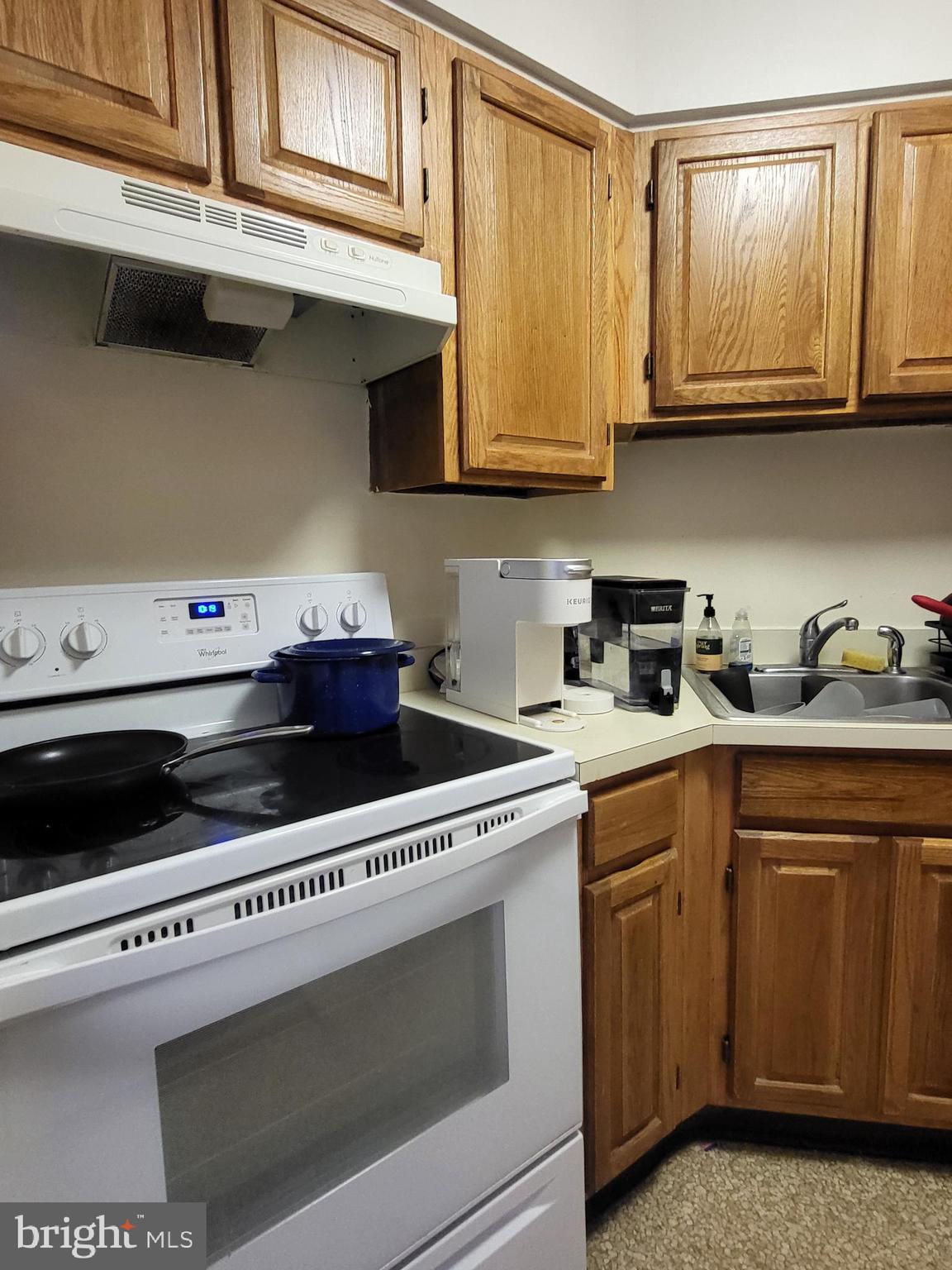 2020 Walnut Street, Unit 22A Philadelphia, PA 19103 - Photo 5 of 22 a kitchen with stainless steel appliances granite countertop a sink and cabinets